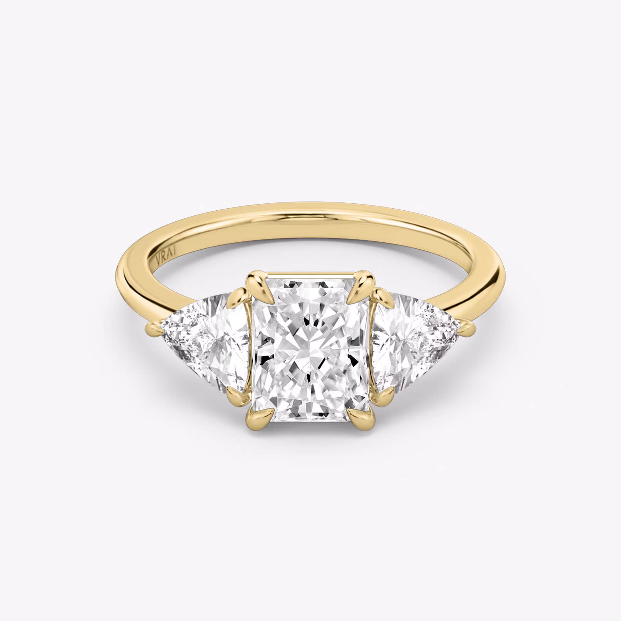 The Three Stone | Radiant | 18k | Yellow Gold | bandAccent: Plain | sideStoneCarat: 0.50ct | sideStoneShape: Trillion | diamondOrientation: vertical | caratWeight: other