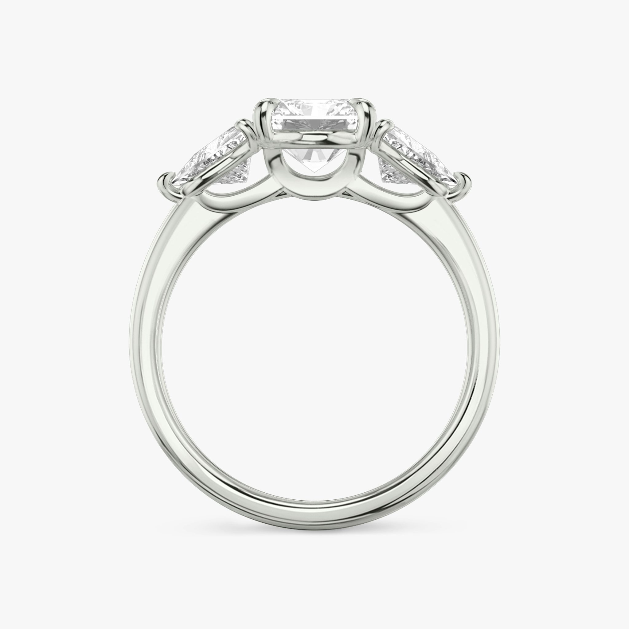The Three Stone | Radiant | Platinum | bandAccent: Plain | sideStoneCarat: 0.50ct | sideStoneShape: Trillion | diamondOrientation: vertical | caratWeight: other