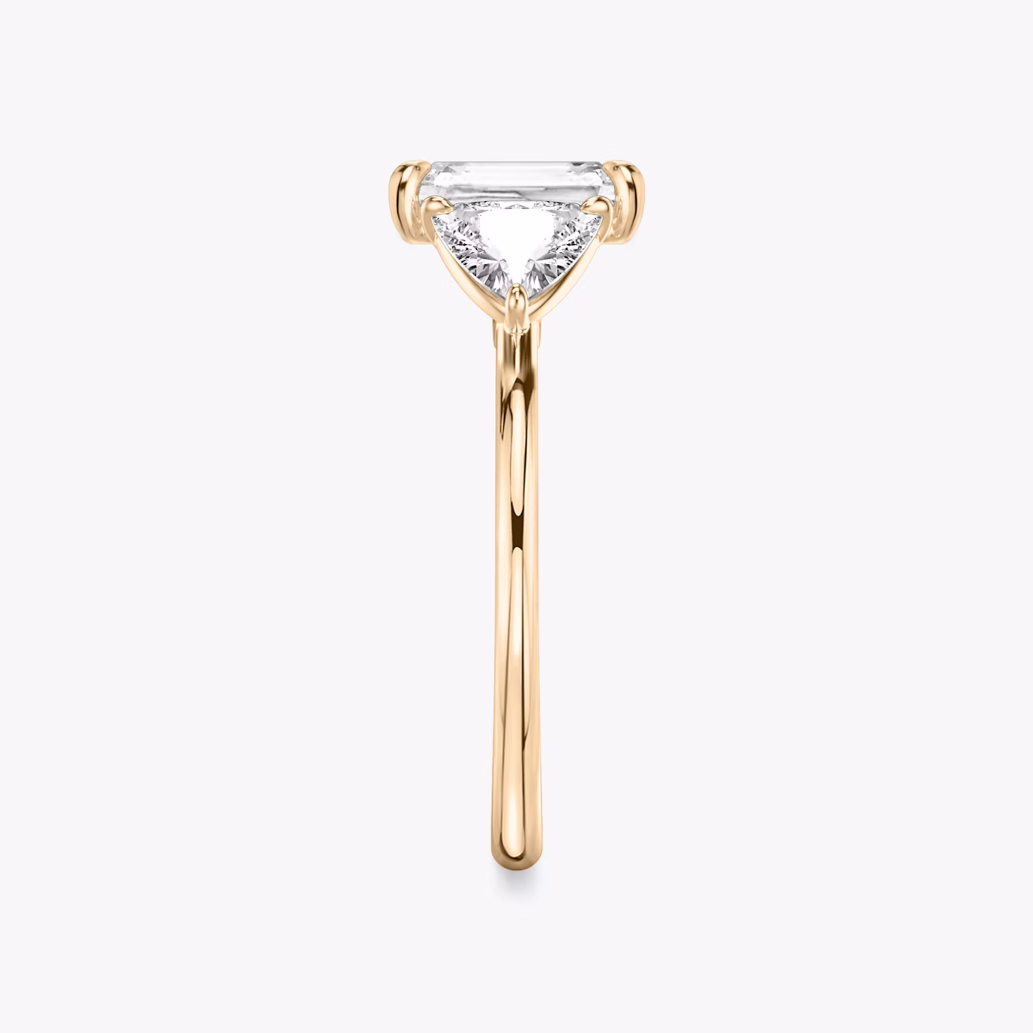 The Three Stone | Radiant | 14k | Rose Gold | bandAccent: Plain | sideStoneCarat: 0.50ct | sideStoneShape: Trillion | diamondOrientation: vertical | caratWeight: other