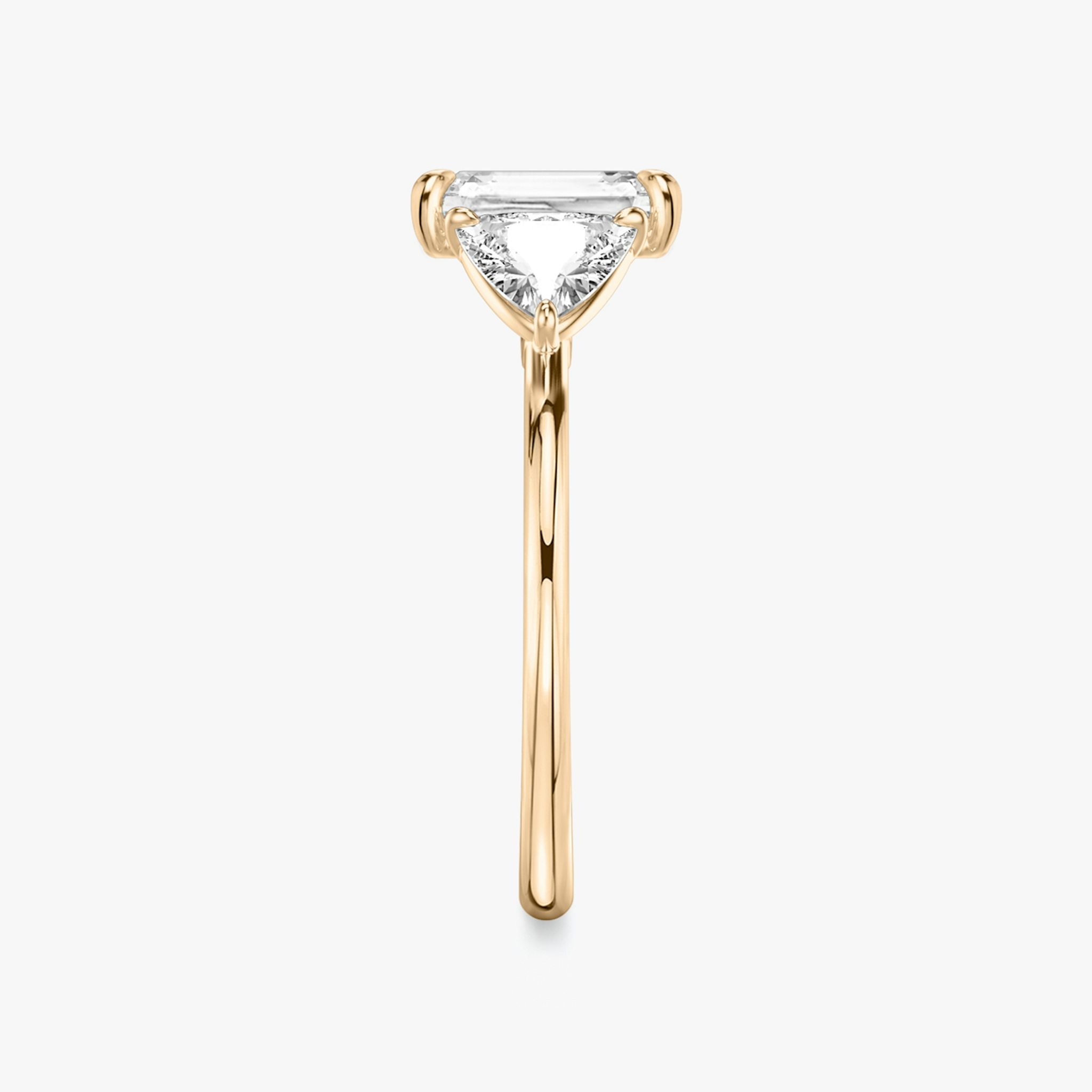 The Three Stone | Radiant | 14k | Rose Gold | bandAccent: Plain | sideStoneCarat: 0.50ct | sideStoneShape: Trillion | diamondOrientation: vertical | caratWeight: other