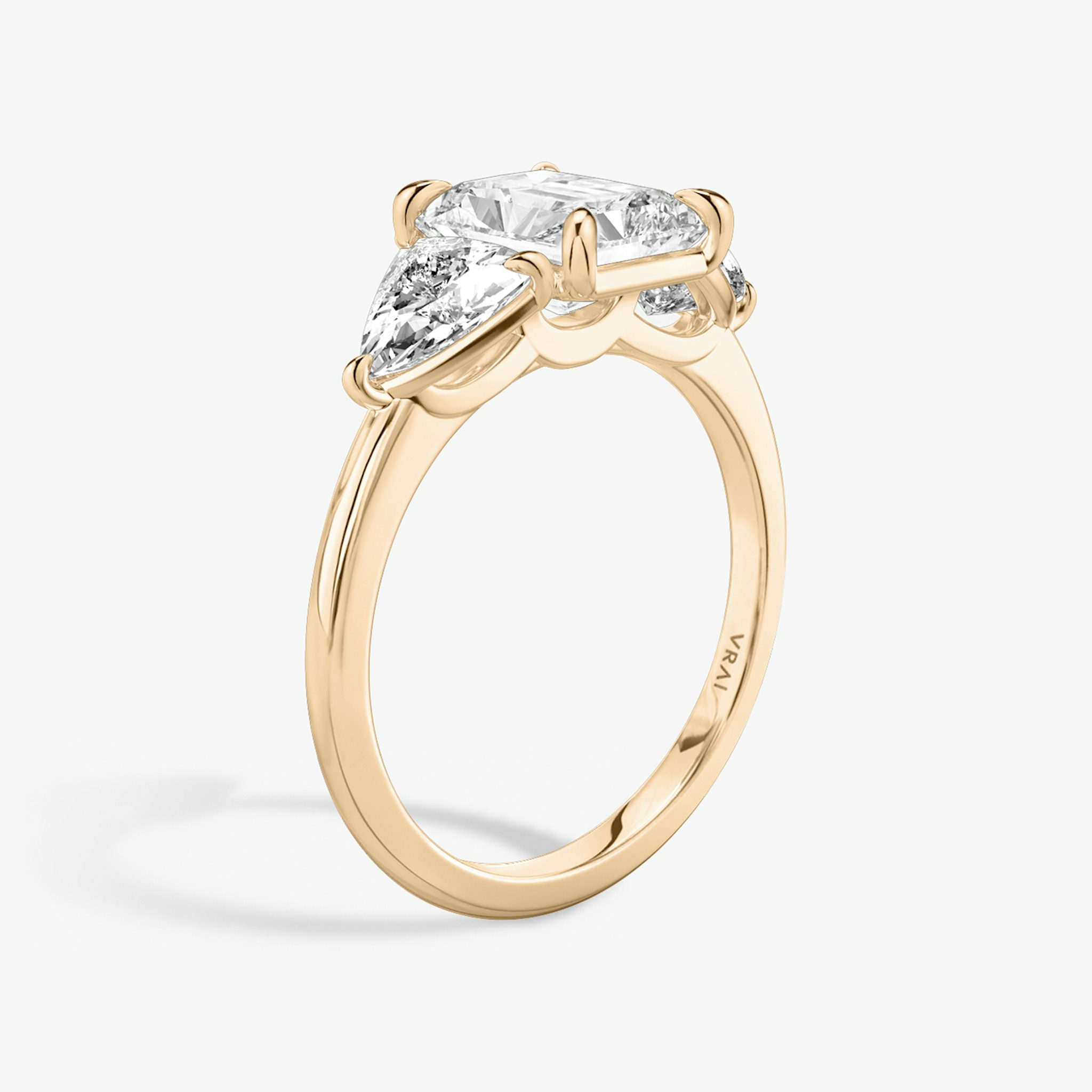 The Three Stone | Radiant | 14k | Rose Gold | bandAccent: Plain | sideStoneCarat: 0.50ct | sideStoneShape: Trillion | diamondOrientation: vertical | caratWeight: other