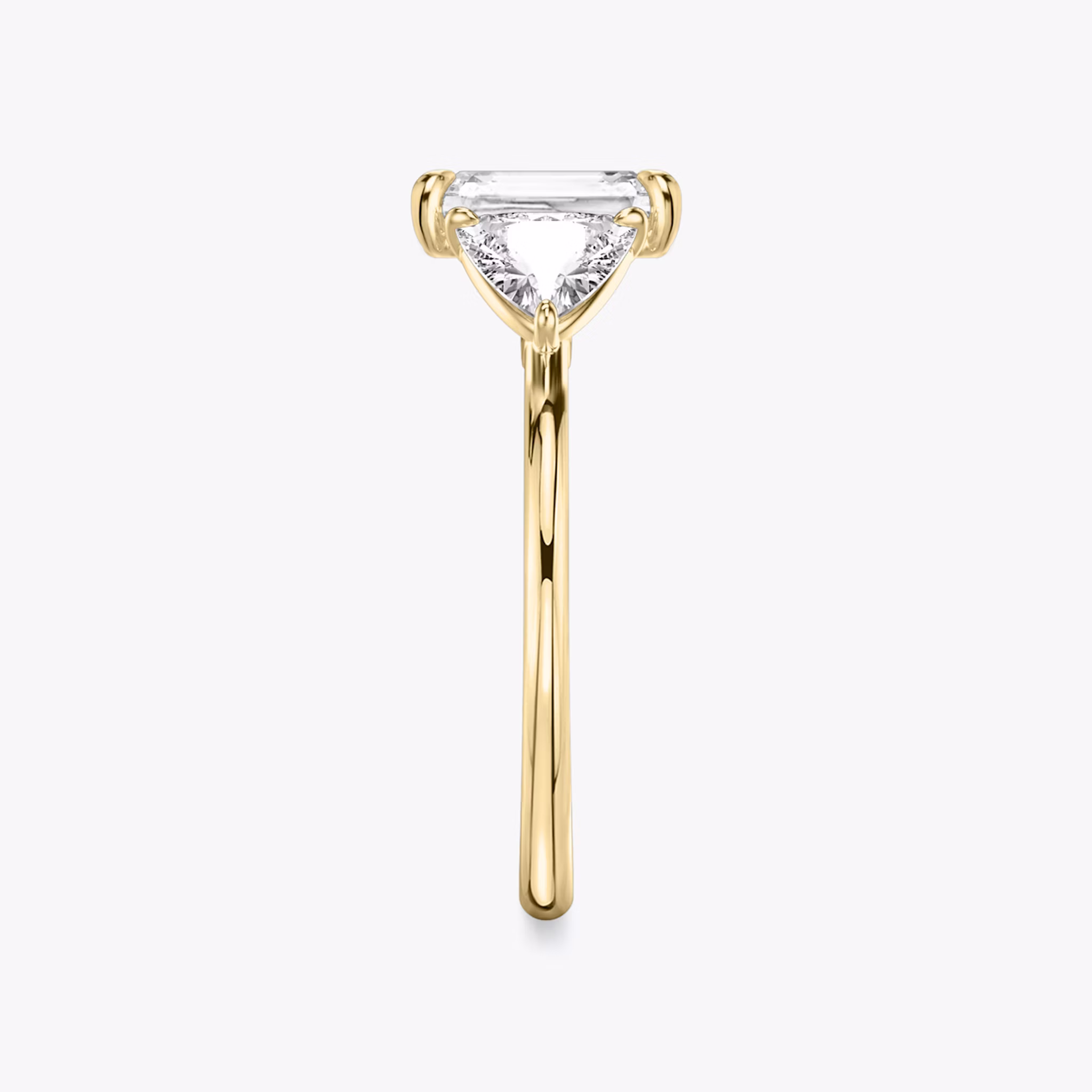 The Three Stone | Radiant | 18k | Yellow Gold | bandAccent: Plain | sideStoneCarat: 0.50ct | sideStoneShape: Trillion | diamondOrientation: vertical | caratWeight: other