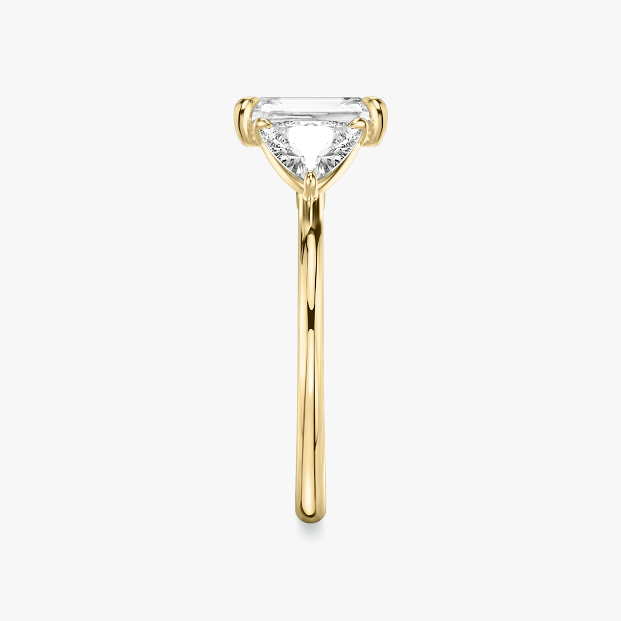 The Three Stone | Radiant | 18k | Yellow Gold | bandAccent: Plain | sideStoneCarat: 0.50ct | sideStoneShape: Trillion | diamondOrientation: vertical | caratWeight: other