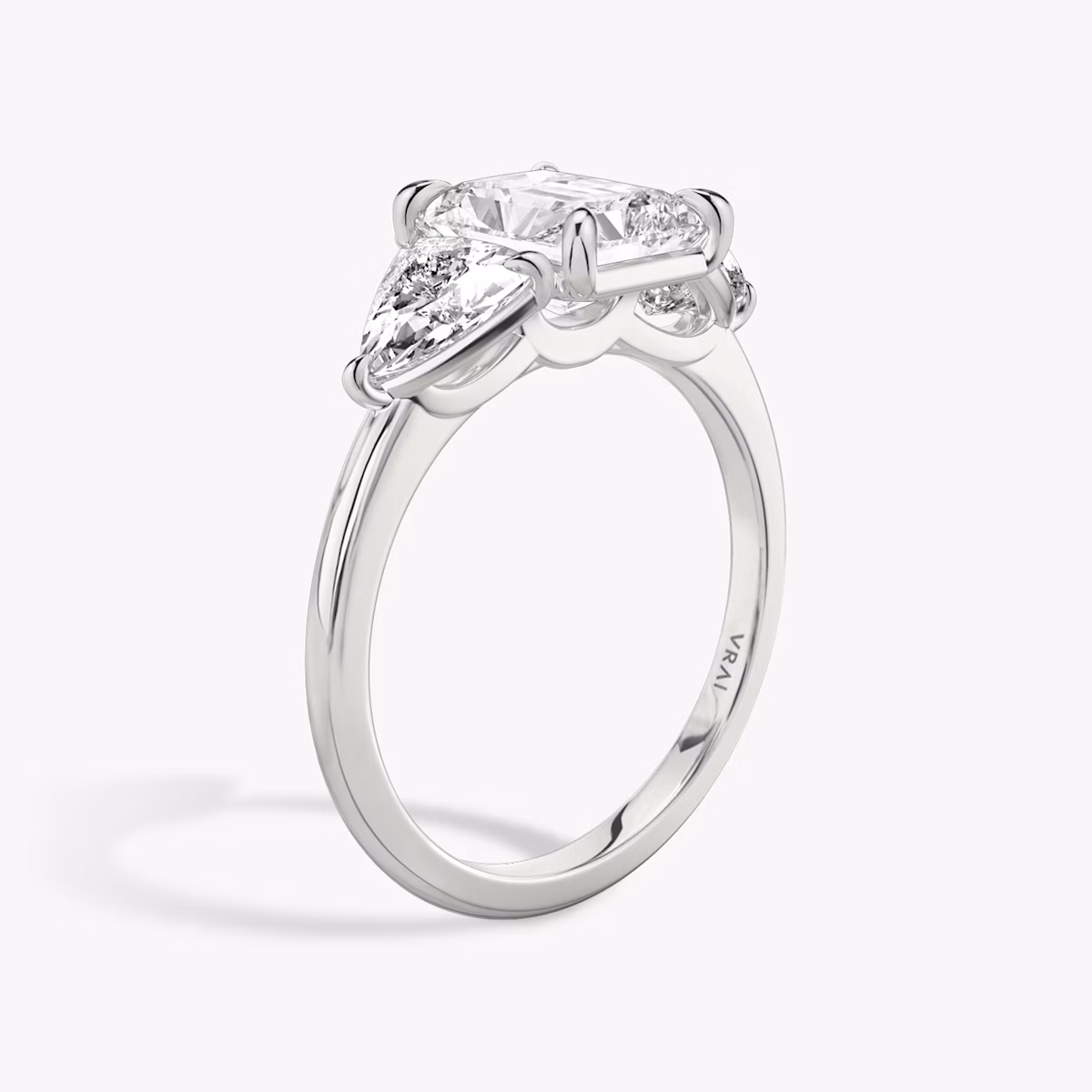 The Three Stone | Radiant | 18k | White Gold | bandAccent: Plain | sideStoneCarat: 0.50ct | sideStoneShape: Trillion | diamondOrientation: vertical | caratWeight: other