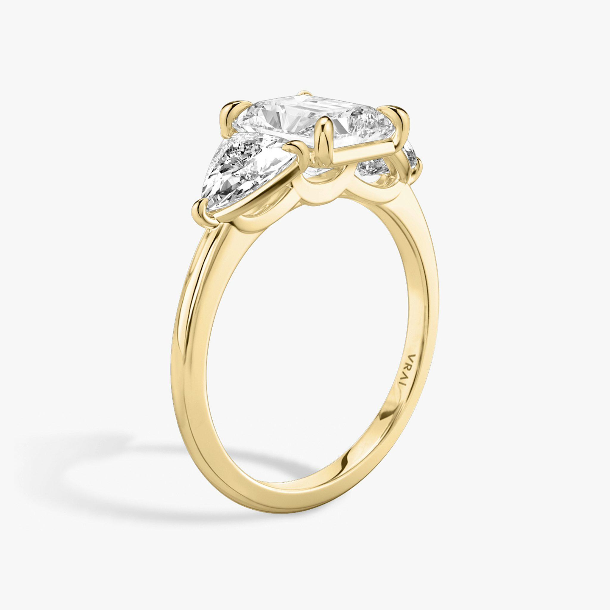 The Three Stone | Radiant | 18k | Yellow Gold | bandAccent: Plain | sideStoneCarat: 0.50ct | sideStoneShape: Trillion | diamondOrientation: vertical | caratWeight: other