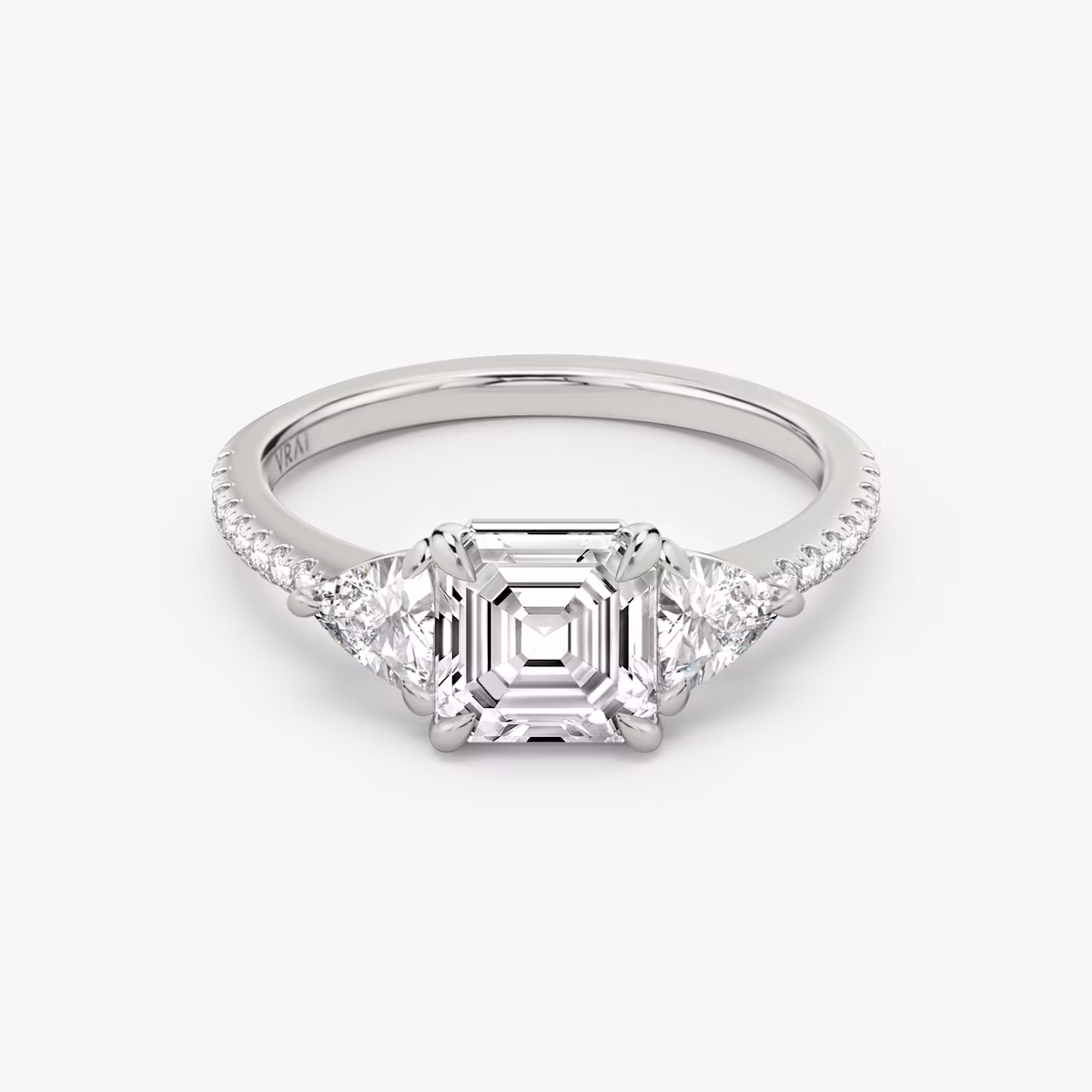 The Three Stone | Asscher | Platinum | bandAccent: Pavé | sideStoneCarat: 0.25ct | sideStoneShape: Trillion | diamondOrientation: vertical | caratWeight: other