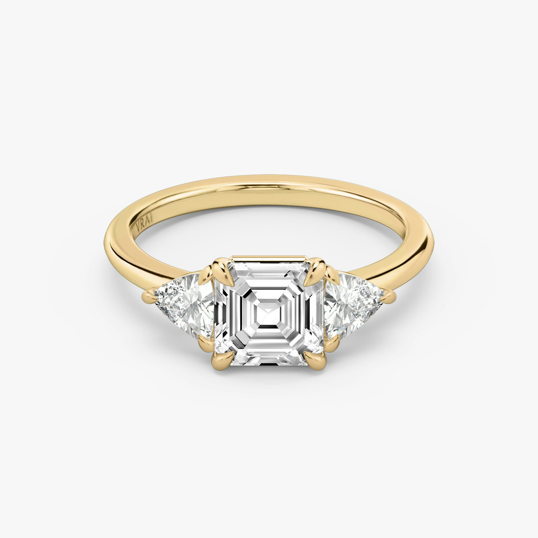 The Three Stone | Asscher | 18k | Yellow Gold | bandAccent: Plain | sideStoneCarat: 0.25ct | sideStoneShape: Trillion | diamondOrientation: vertical | caratWeight: other