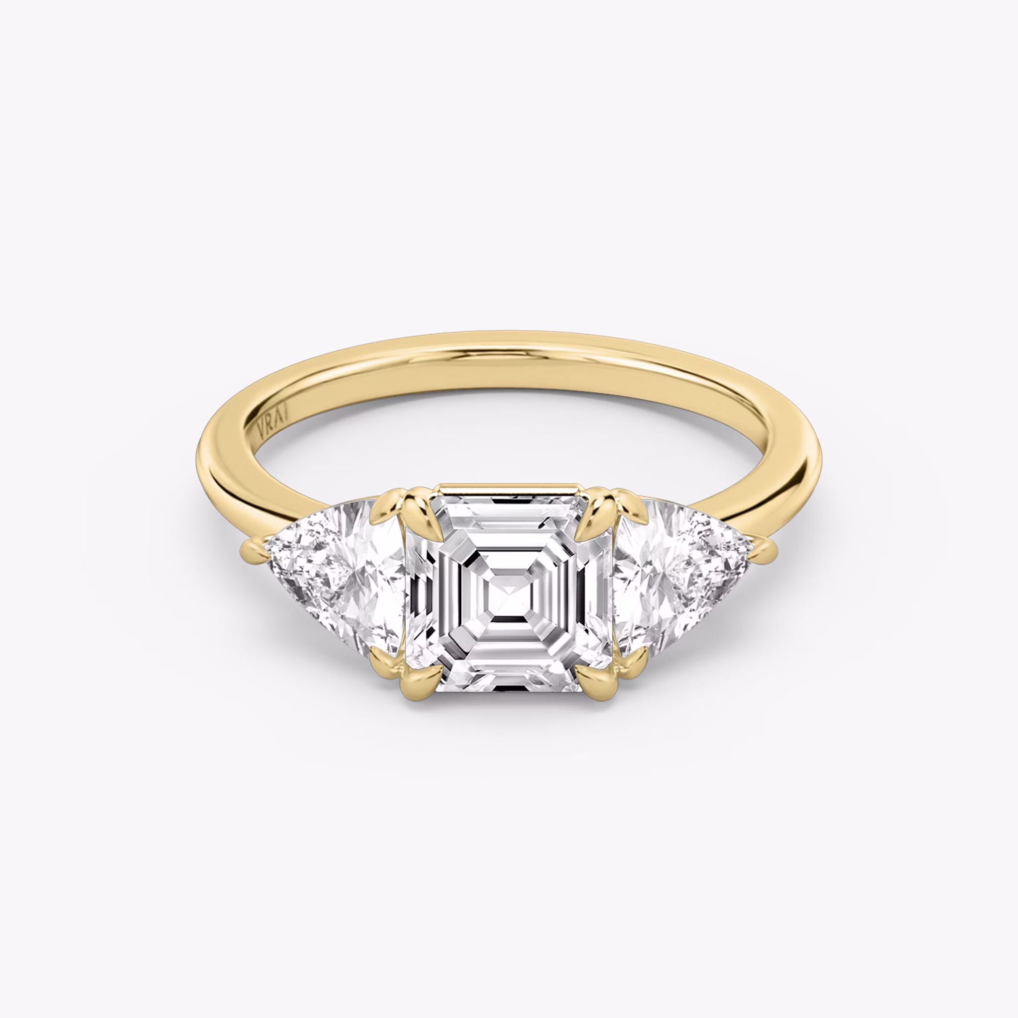 The Three Stone | Asscher | 18k | Yellow Gold | bandAccent: Plain | sideStoneCarat: 0.50ct | sideStoneShape: Trillion | diamondOrientation: vertical | caratWeight: other