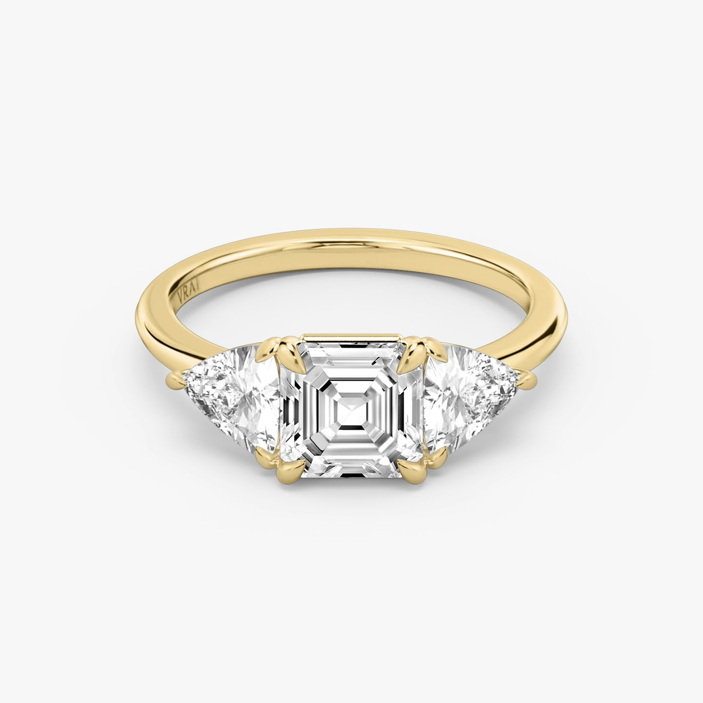 The Three Stone | Asscher | 18k | Yellow Gold | bandAccent: Plain | sideStoneCarat: 0.50ct | sideStoneShape: Trillion | diamondOrientation: vertical | caratWeight: other
