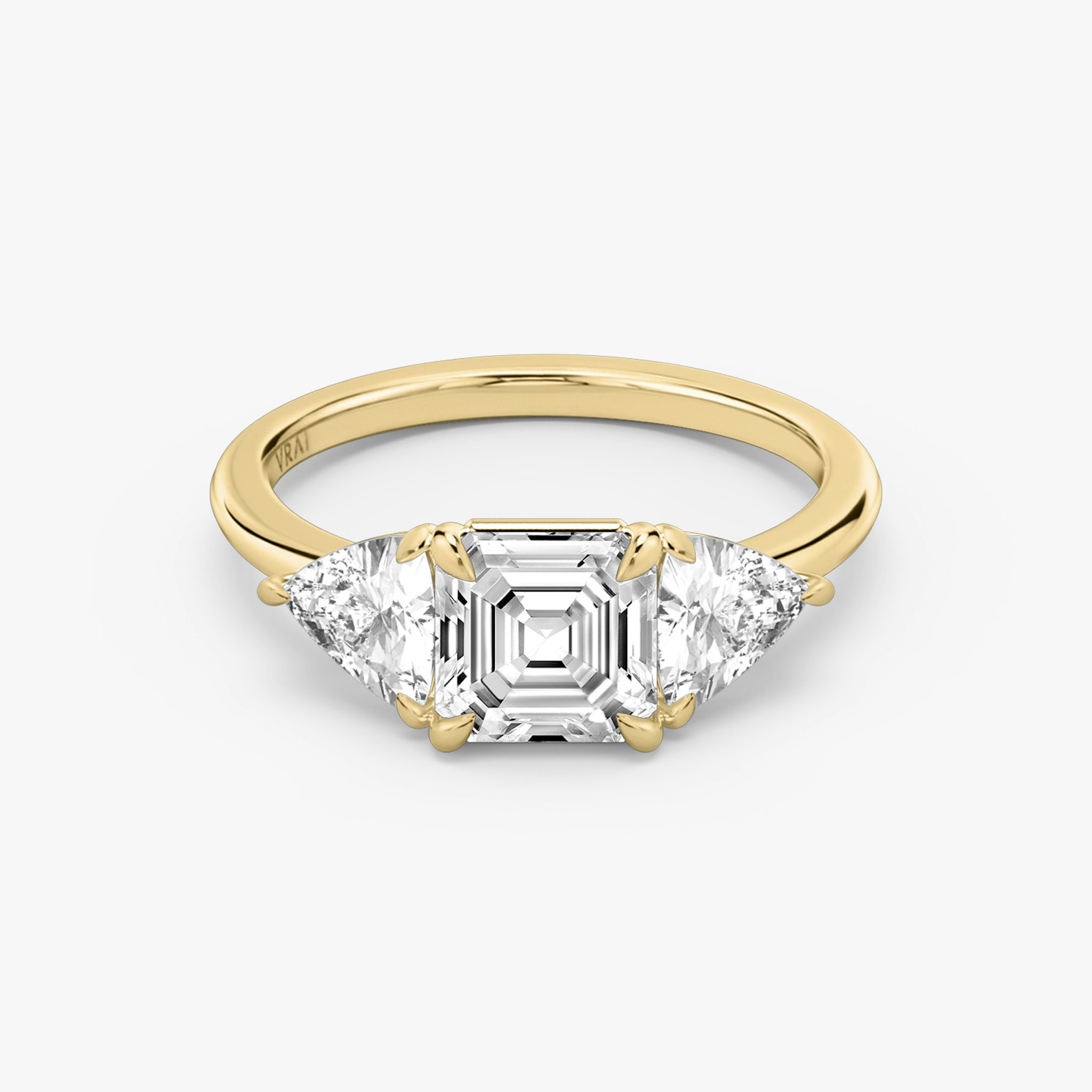 The Three Stone | Asscher | 18k | Yellow Gold | bandAccent: Plain | sideStoneCarat: 0.50ct | sideStoneShape: Trillion | diamondOrientation: vertical | caratWeight: other