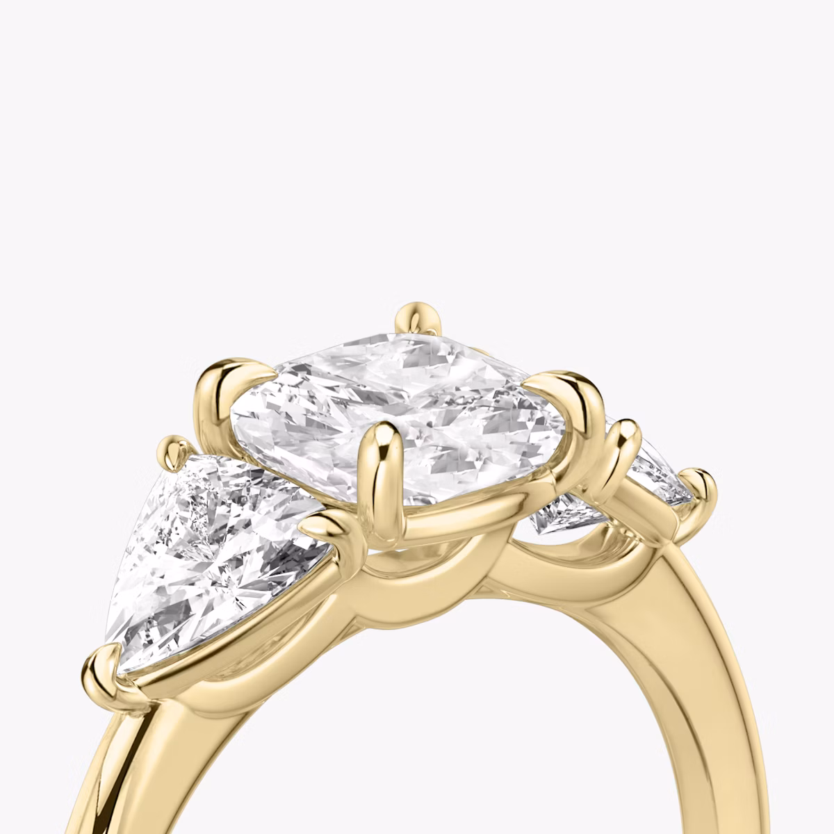 The Three Stone | Cushion | 18k | Yellow Gold | bandAccent: Plain | sideStoneCarat: 0.50ct | sideStoneShape: Trillion | diamondOrientation: vertical | caratWeight: other