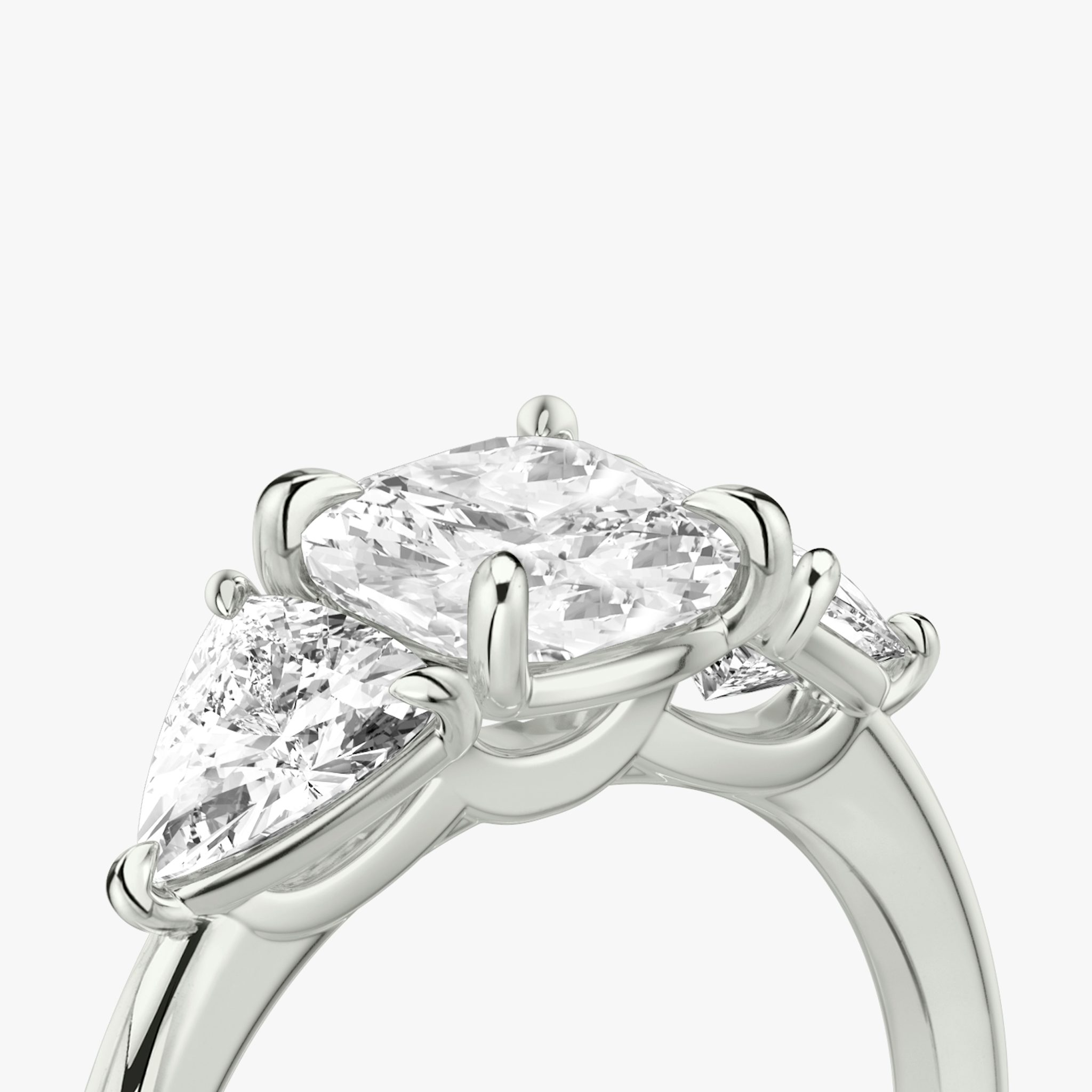 The Three Stone | Cushion | 18k | White Gold | bandAccent: Plain | sideStoneCarat: 0.50ct | sideStoneShape: Trillion | diamondOrientation: vertical | caratWeight: other