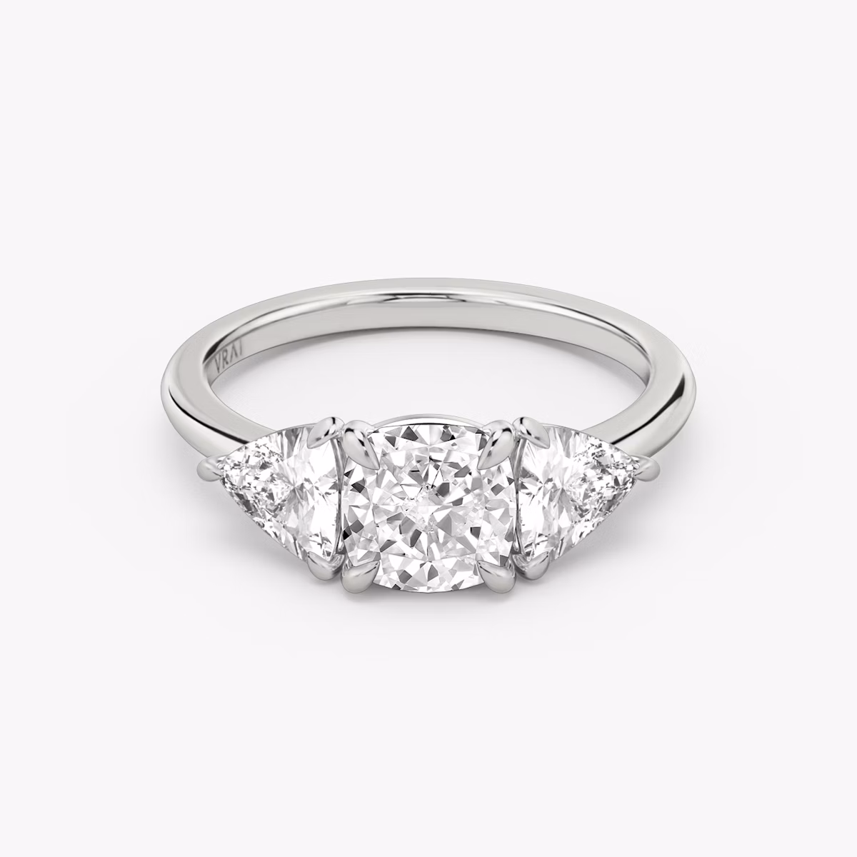 The Three Stone | Cushion | 18k | White Gold | bandAccent: Plain | sideStoneCarat: 0.50ct | sideStoneShape: Trillion | diamondOrientation: vertical | caratWeight: other