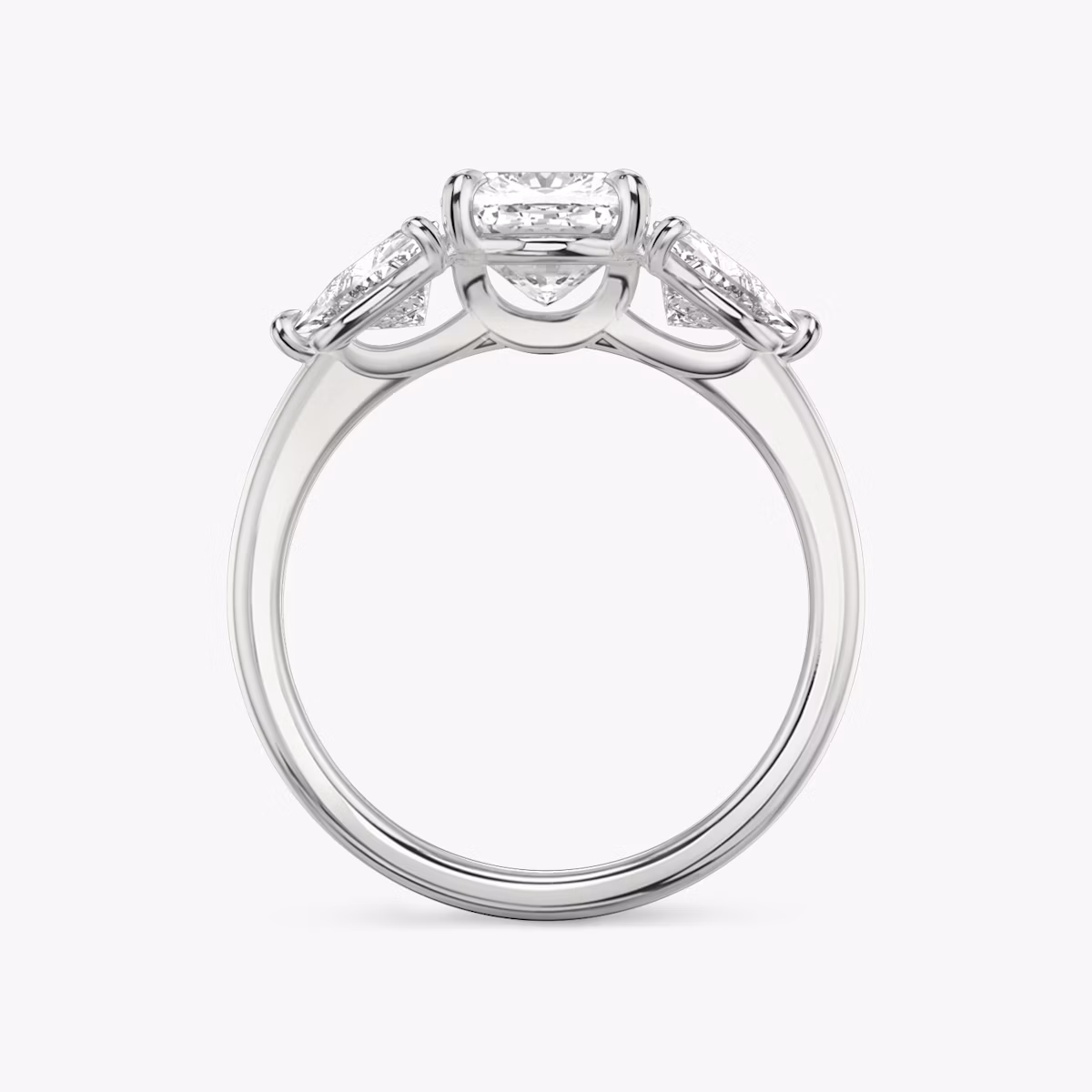 The Three Stone | Cushion | 18k | White Gold | bandAccent: Plain | sideStoneCarat: 0.50ct | sideStoneShape: Trillion | diamondOrientation: vertical | caratWeight: other