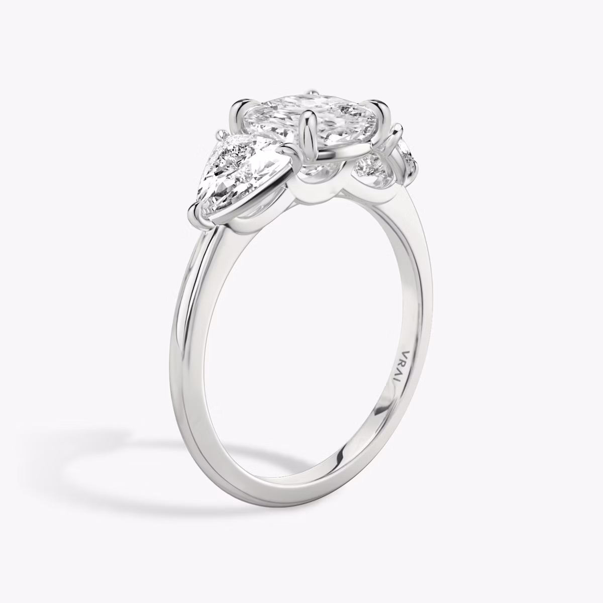 The Three Stone | Cushion | 18k | White Gold | bandAccent: Plain | sideStoneCarat: 0.50ct | sideStoneShape: Trillion | diamondOrientation: vertical | caratWeight: other
