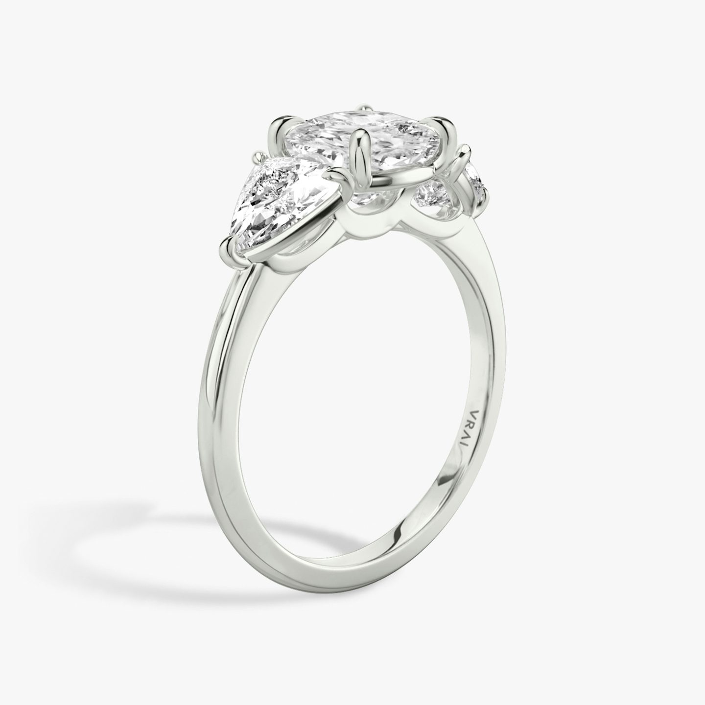 The Three Stone | Cushion | 18k | White Gold | bandAccent: Plain | sideStoneCarat: 0.50ct | sideStoneShape: Trillion | diamondOrientation: vertical | caratWeight: other