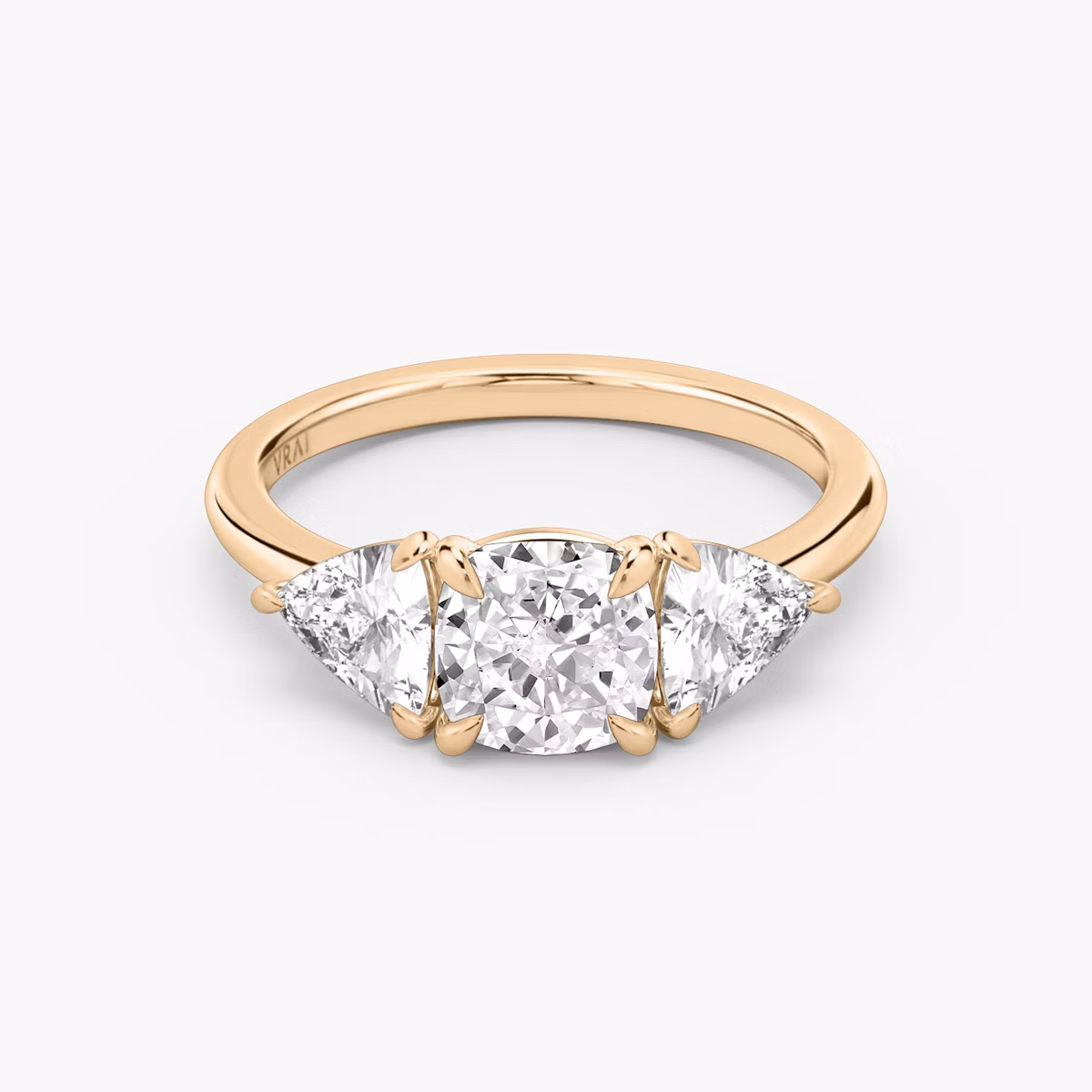 The Three Stone | Cushion | 14k | Rose Gold | bandAccent: Plain | sideStoneCarat: 0.50ct | sideStoneShape: Trillion | diamondOrientation: vertical | caratWeight: other
