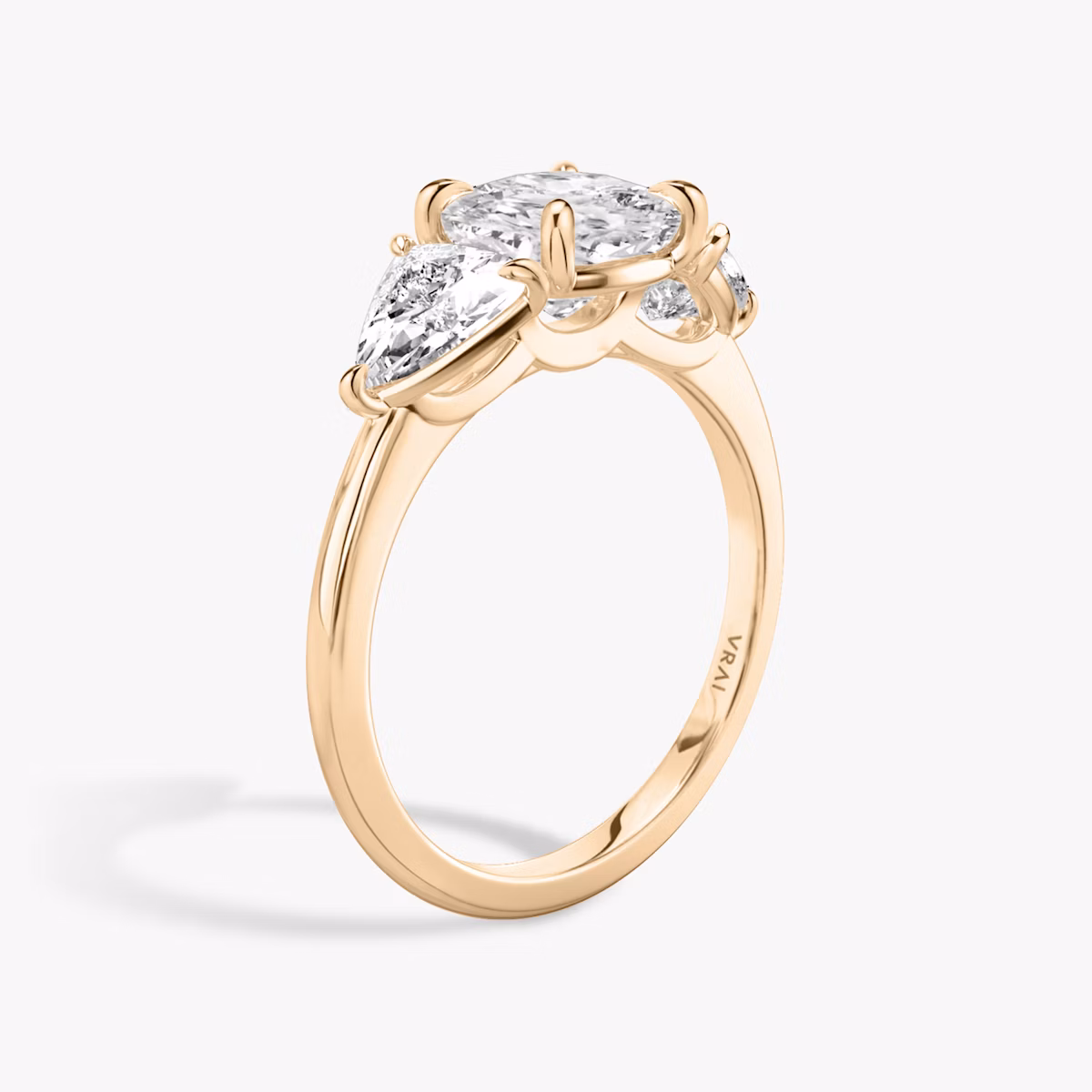 The Three Stone | Cushion | 14k | Rose Gold | bandAccent: Plain | sideStoneCarat: 0.50ct | sideStoneShape: Trillion | diamondOrientation: vertical | caratWeight: other