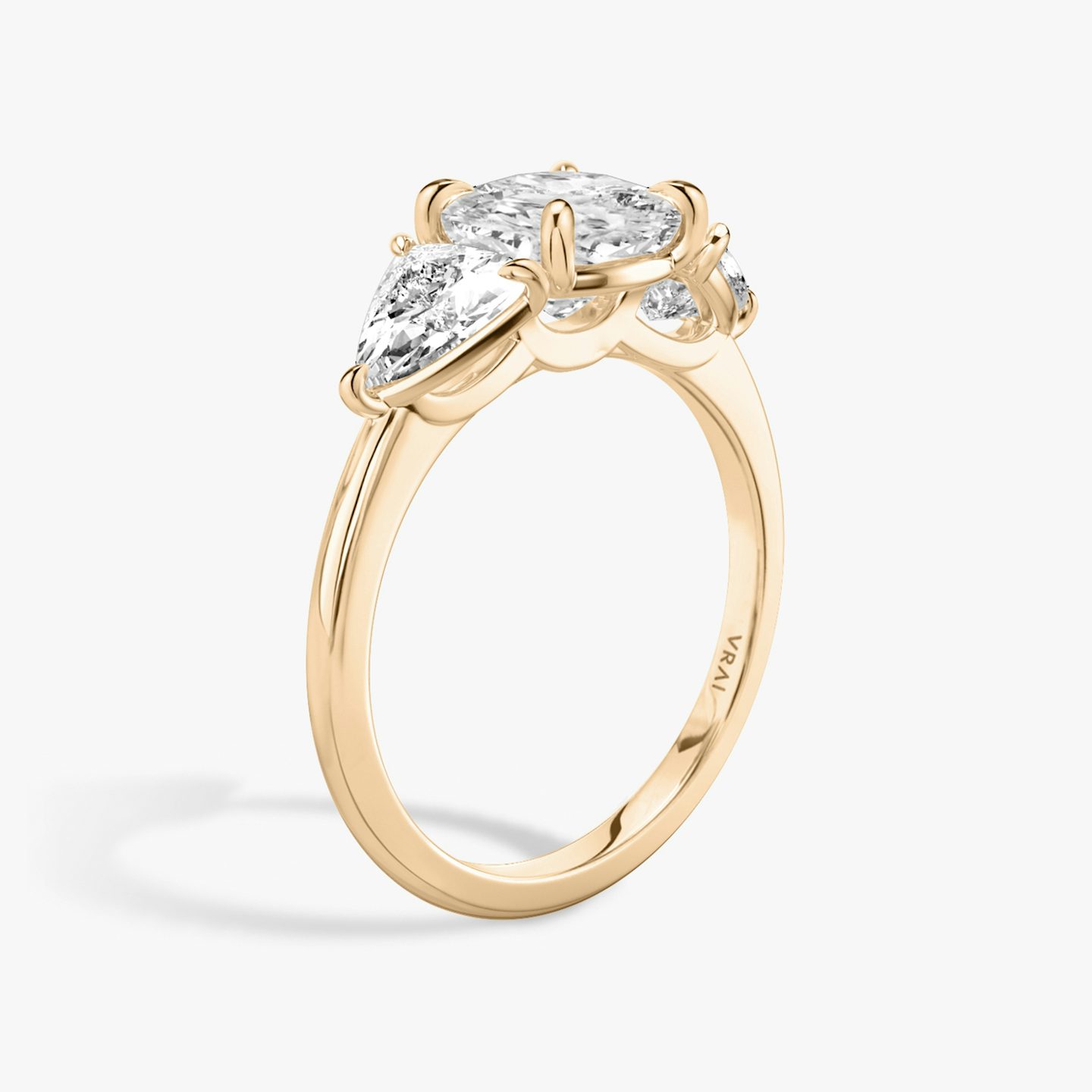 The Three Stone | Cushion | 14k | Rose Gold | bandAccent: Plain | sideStoneCarat: 0.50ct | sideStoneShape: Trillion | diamondOrientation: vertical | caratWeight: other