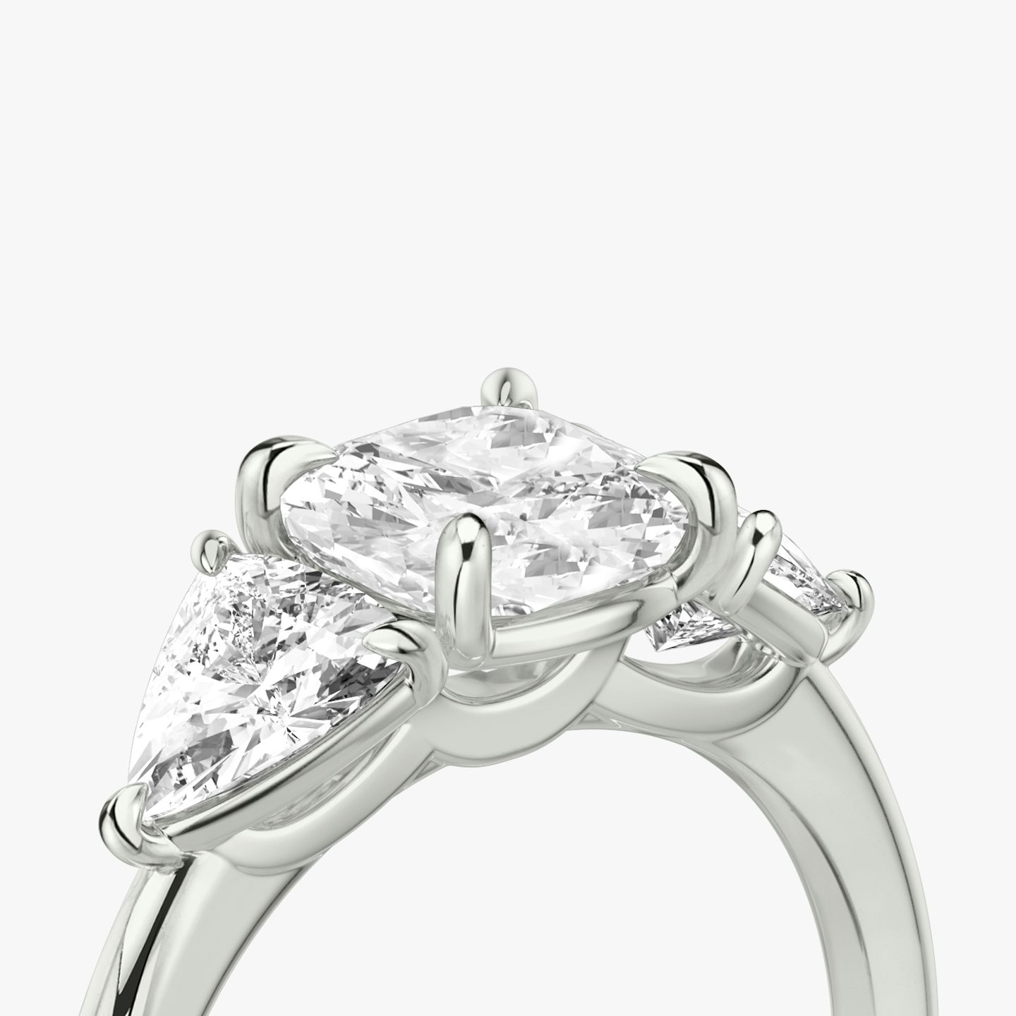 The Three Stone | Cushion | Platinum | bandAccent: Plain | sideStoneCarat: 0.50ct | sideStoneShape: Trillion | diamondOrientation: vertical | caratWeight: other