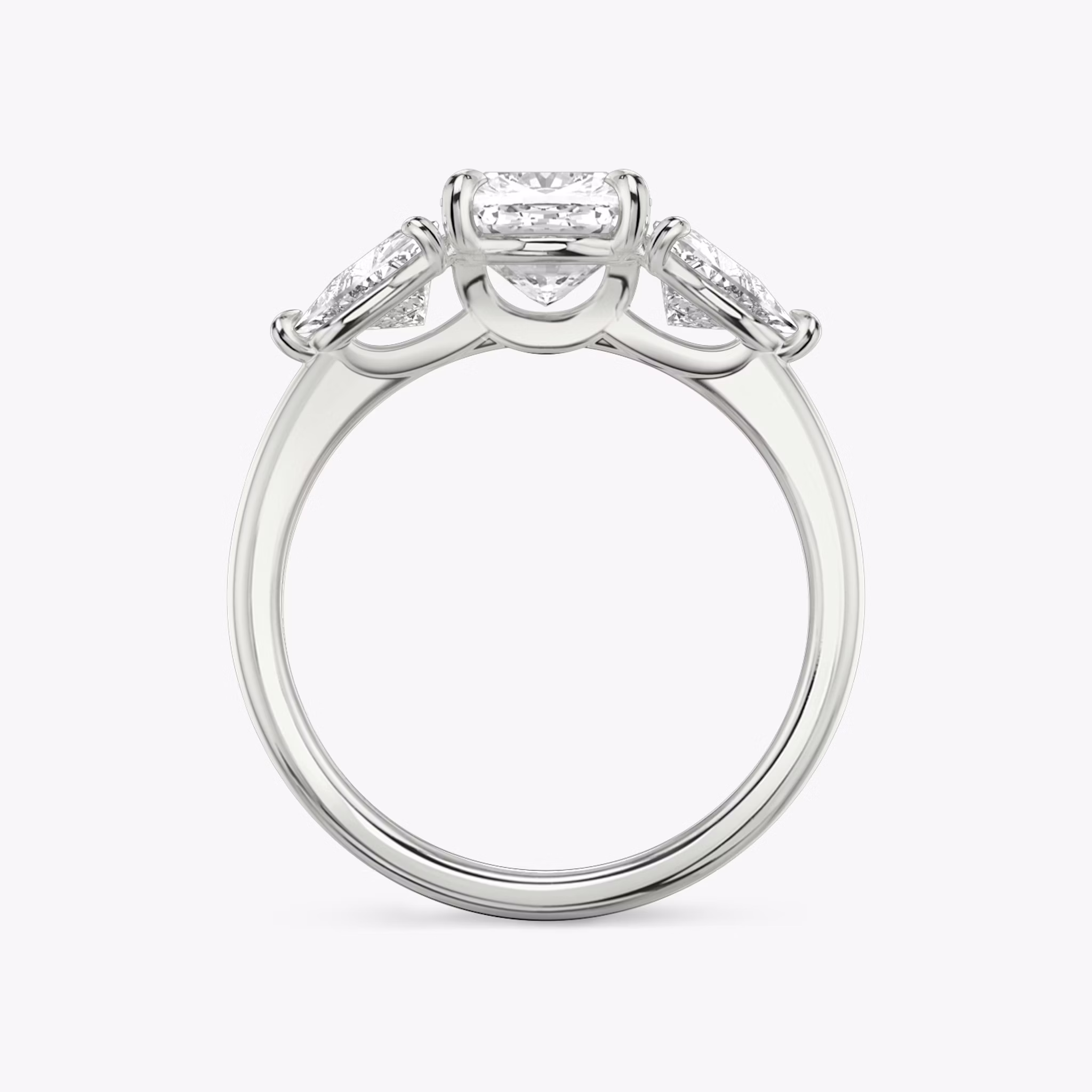 The Three Stone | Cushion | Platinum | bandAccent: Plain | sideStoneCarat: 0.50ct | sideStoneShape: Trillion | diamondOrientation: vertical | caratWeight: other