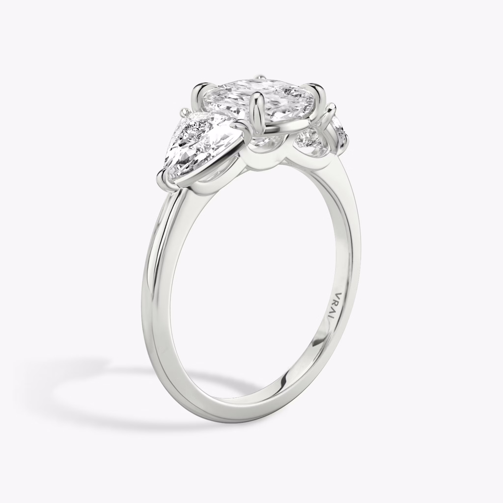 The Three Stone | Cushion | Platinum | bandAccent: Plain | sideStoneCarat: 0.50ct | sideStoneShape: Trillion | diamondOrientation: vertical | caratWeight: other