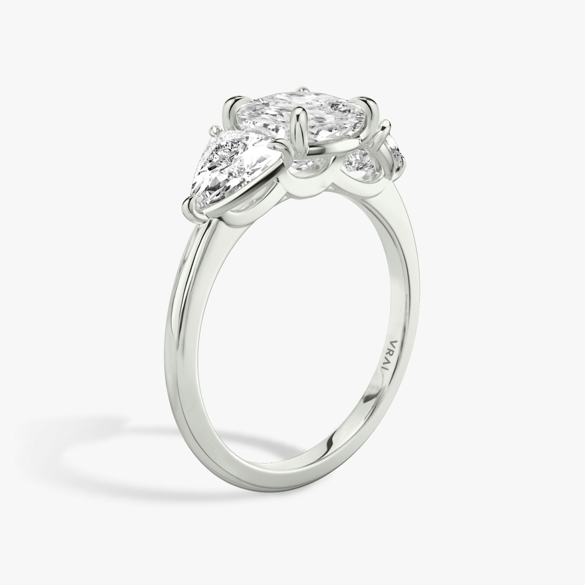 The Three Stone | Cushion | Platinum | bandAccent: Plain | sideStoneCarat: 0.50ct | sideStoneShape: Trillion | diamondOrientation: vertical | caratWeight: other