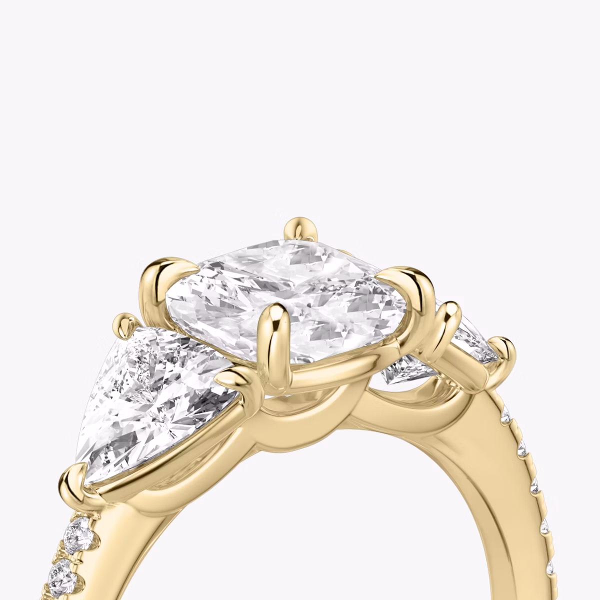 The Three Stone | Cushion | 18k | Yellow Gold | bandAccent: Pavé | sideStoneCarat: 0.50ct | sideStoneShape: Trillion | diamondOrientation: vertical | caratWeight: other