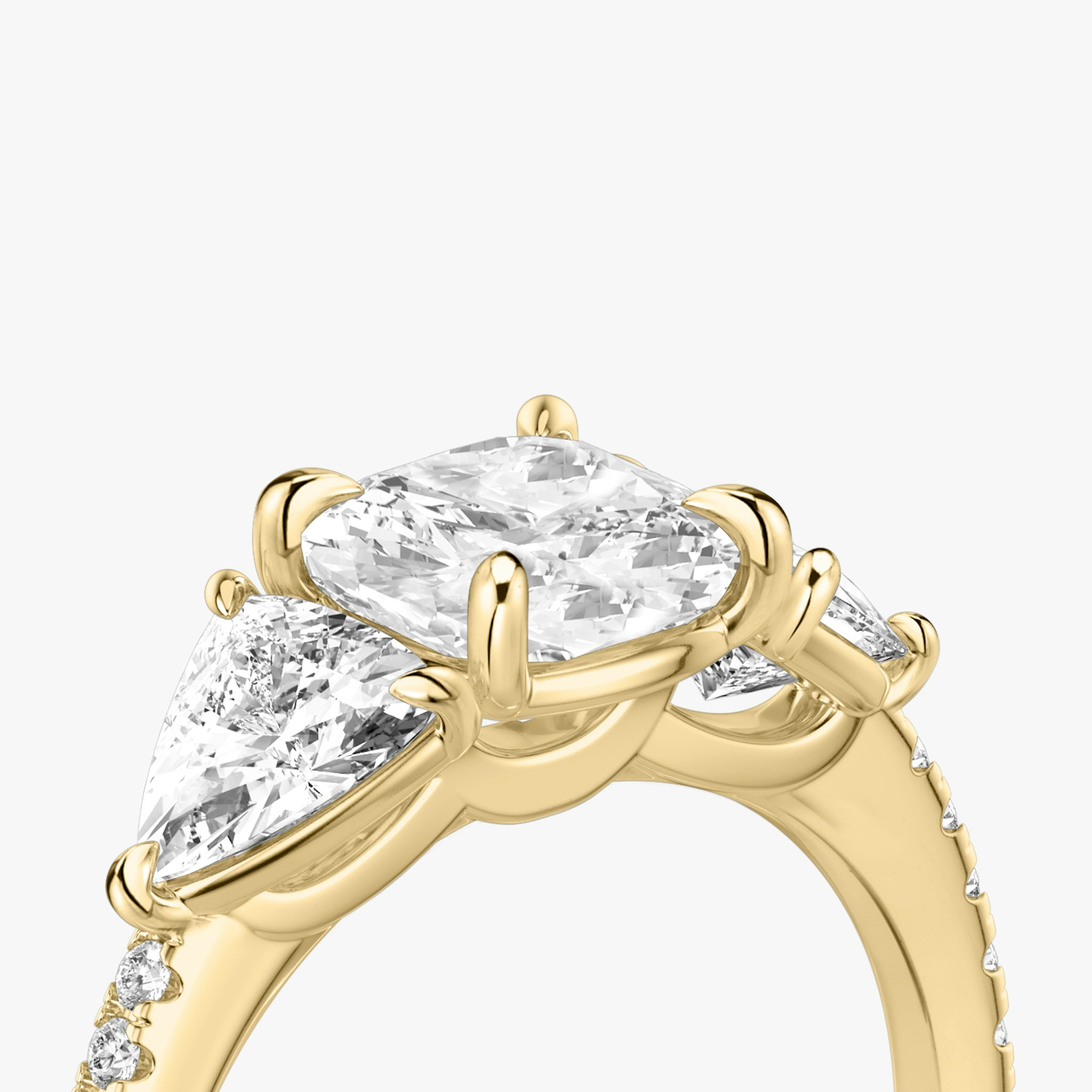 The Three Stone | Cushion | 18k | Yellow Gold | bandAccent: Pavé | sideStoneCarat: 0.50ct | sideStoneShape: Trillion | diamondOrientation: vertical | caratWeight: other