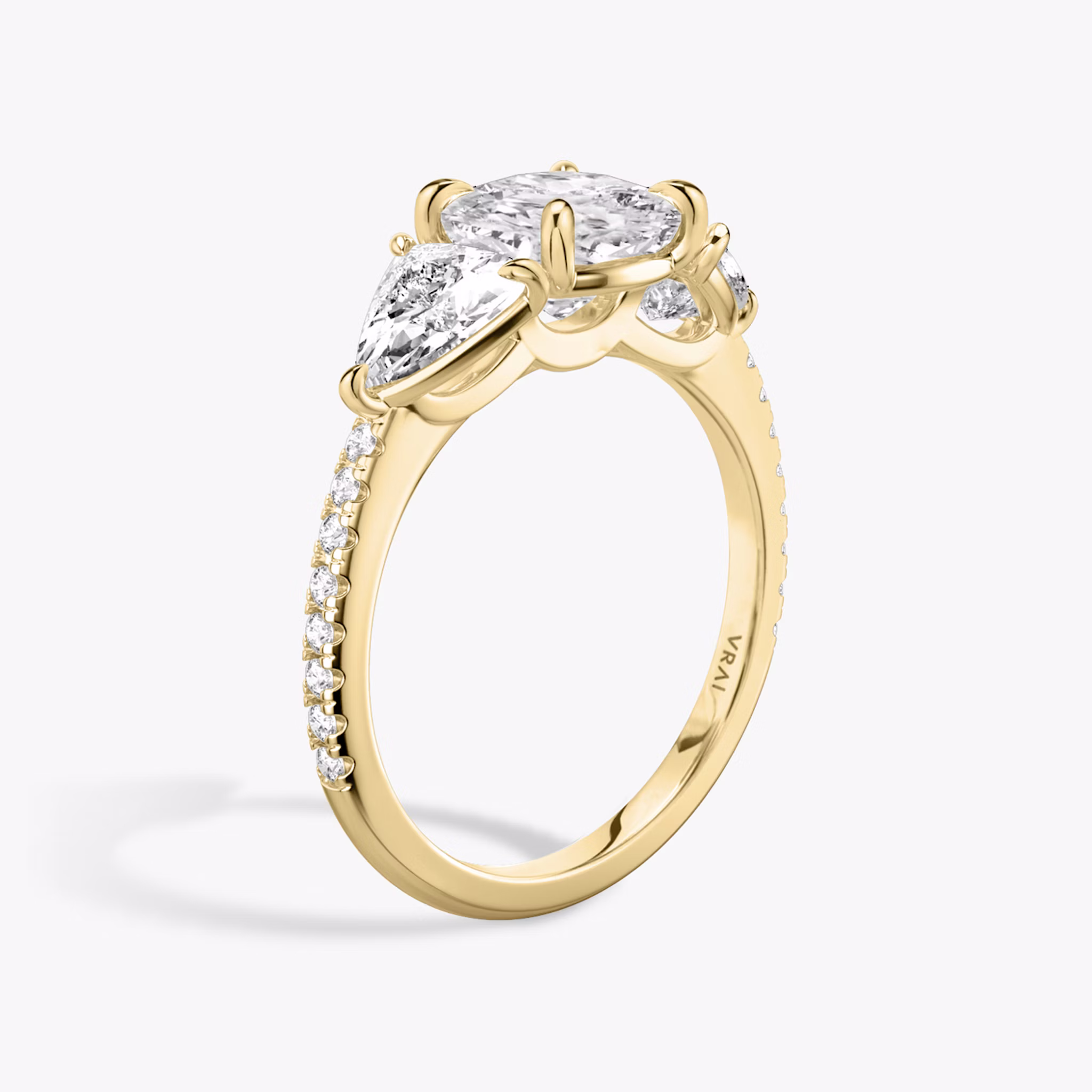 The Three Stone | Cushion | 18k | Yellow Gold | bandAccent: Pavé | sideStoneCarat: 0.50ct | sideStoneShape: Trillion | diamondOrientation: vertical | caratWeight: other