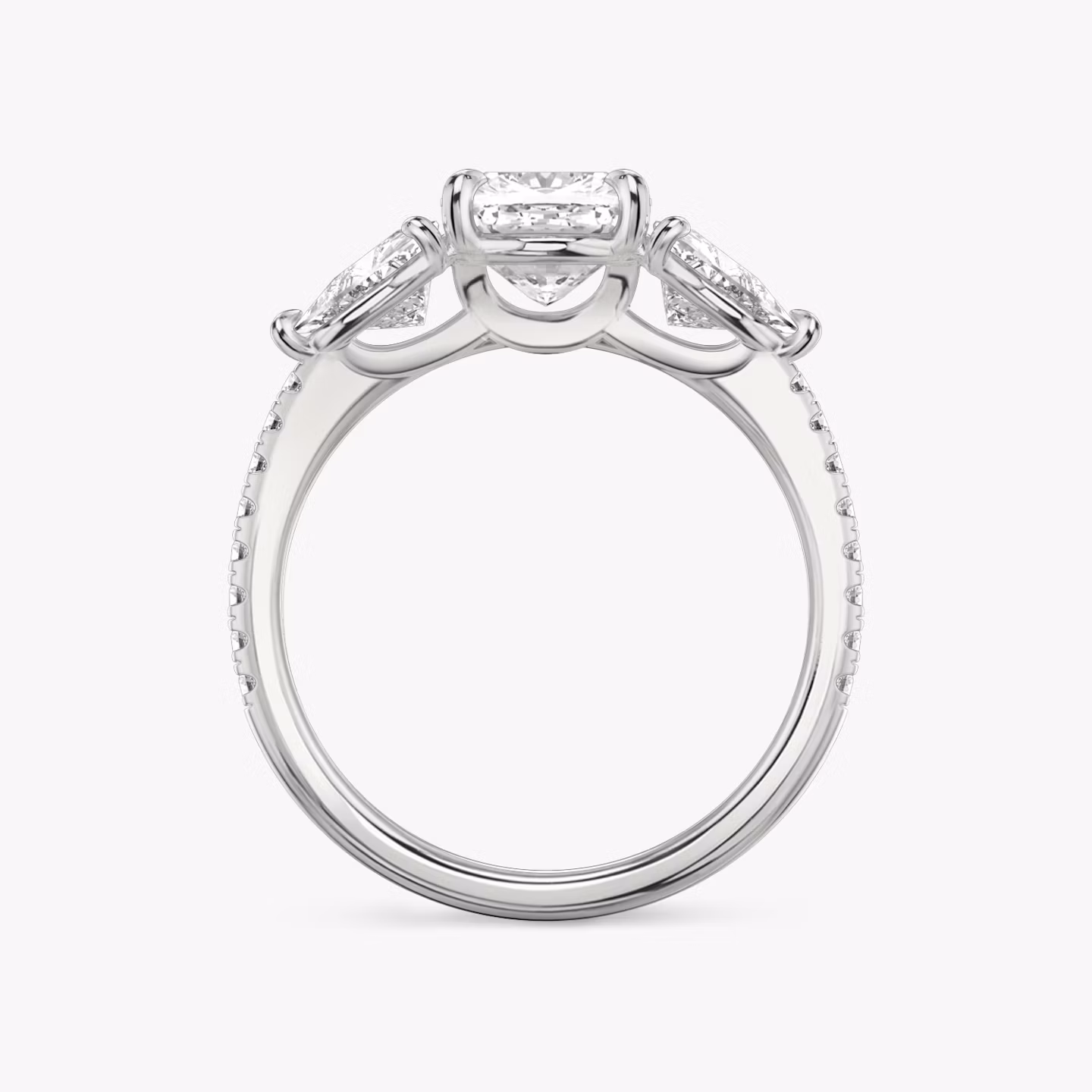 The Three Stone | Cushion | 18k | White Gold | bandAccent: Pavé | sideStoneCarat: 0.50ct | sideStoneShape: Trillion | diamondOrientation: vertical | caratWeight: other