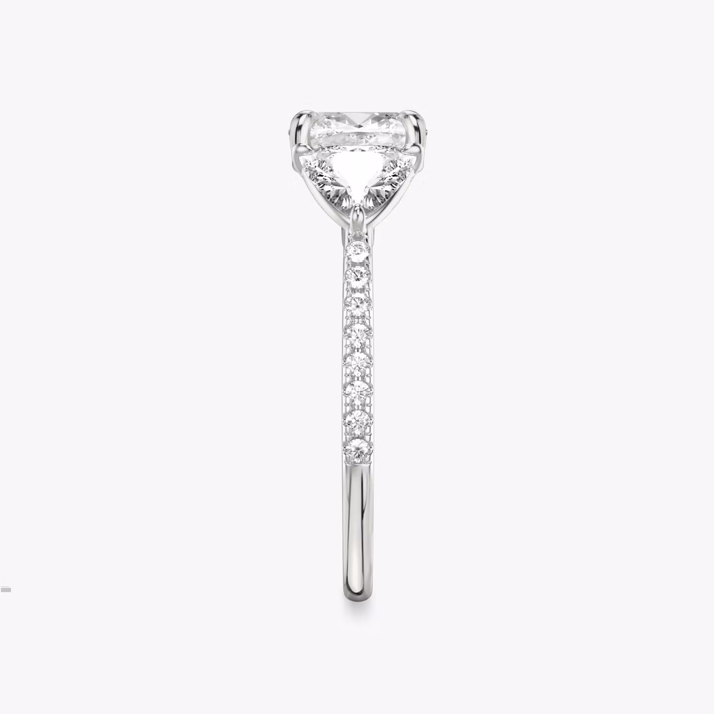 The Three Stone | Cushion | 18k | White Gold | bandAccent: Pavé | sideStoneCarat: 0.50ct | sideStoneShape: Trillion | diamondOrientation: vertical | caratWeight: other