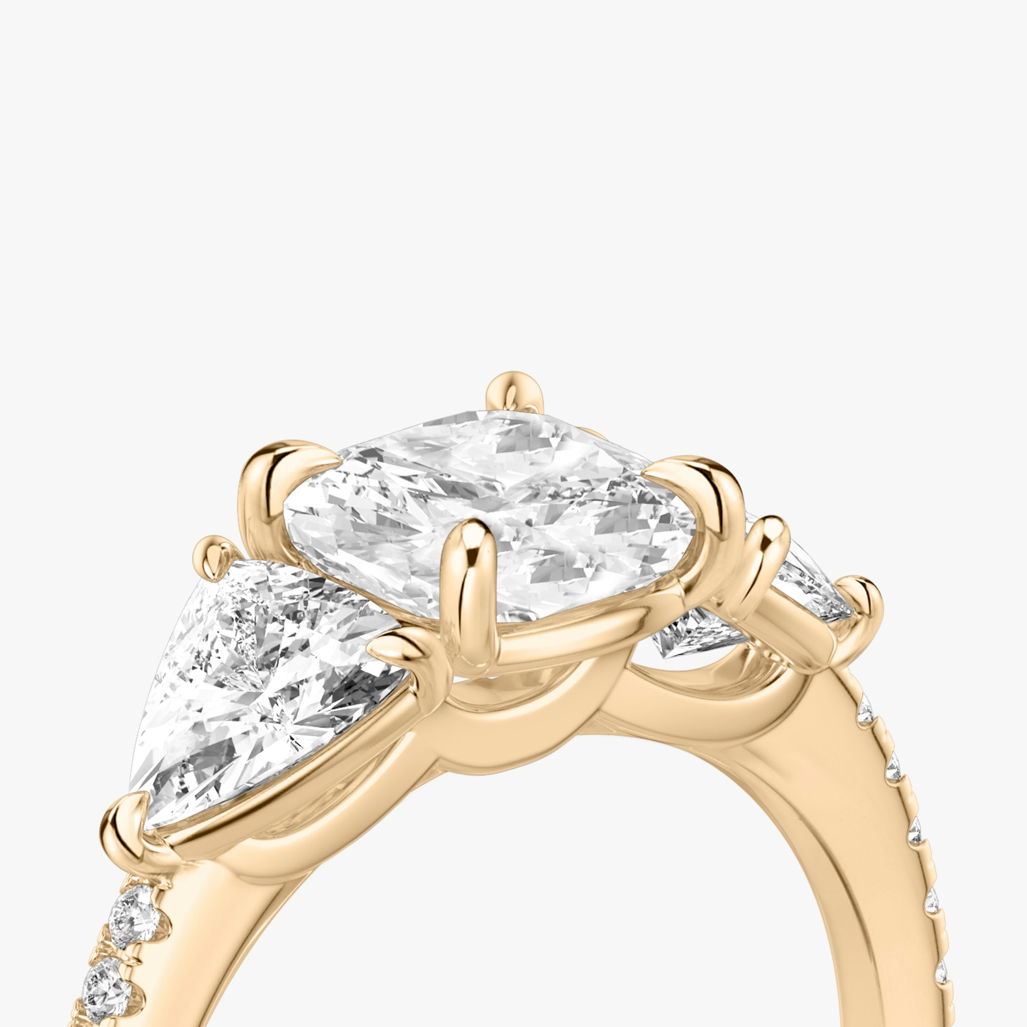 The Three Stone | Cushion | 14k | Rose Gold | bandAccent: Pavé | sideStoneCarat: 0.50ct | sideStoneShape: Trillion | diamondOrientation: vertical | caratWeight: other