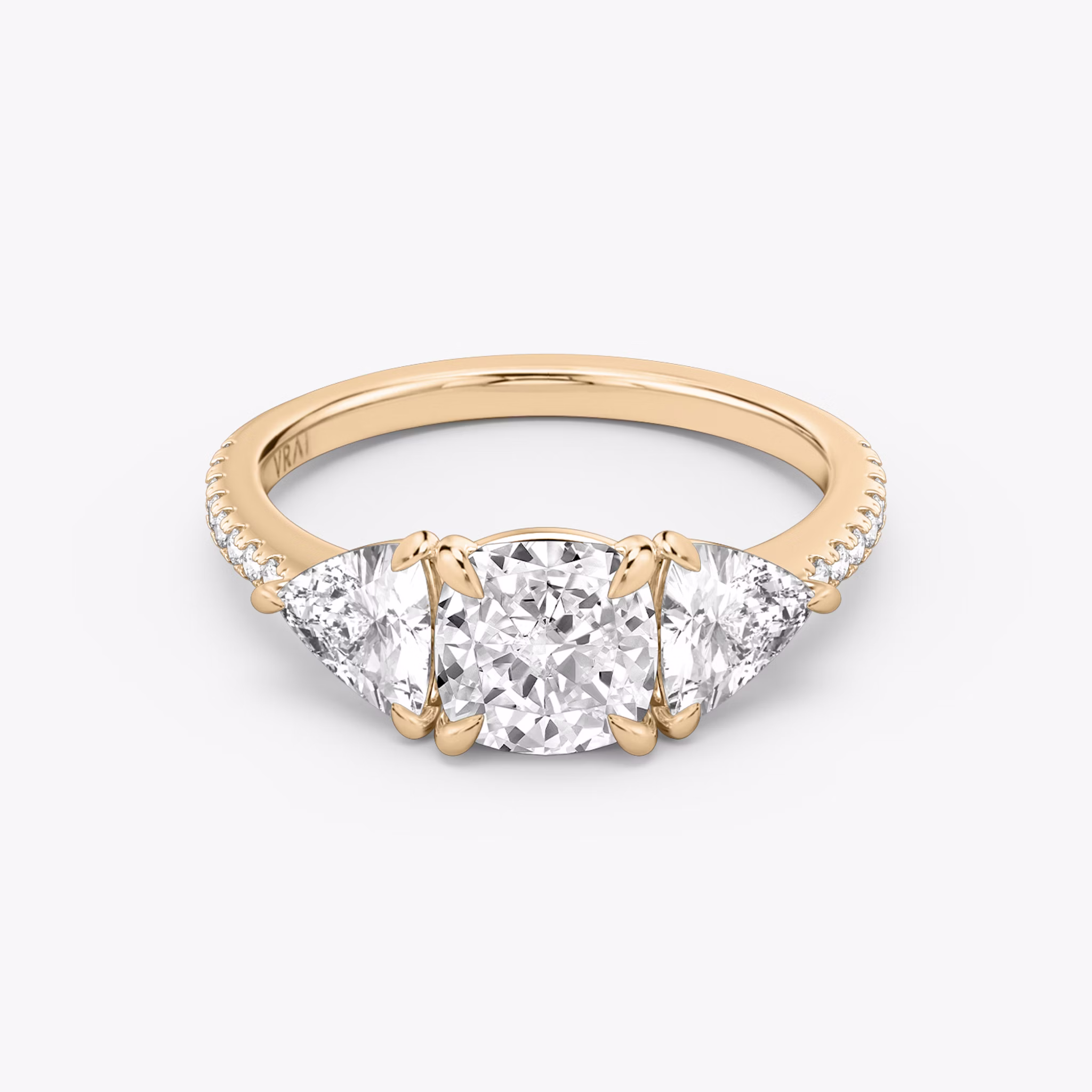 The Three Stone | Cushion | 14k | Rose Gold | bandAccent: Pavé | sideStoneCarat: 0.50ct | sideStoneShape: Trillion | diamondOrientation: vertical | caratWeight: other