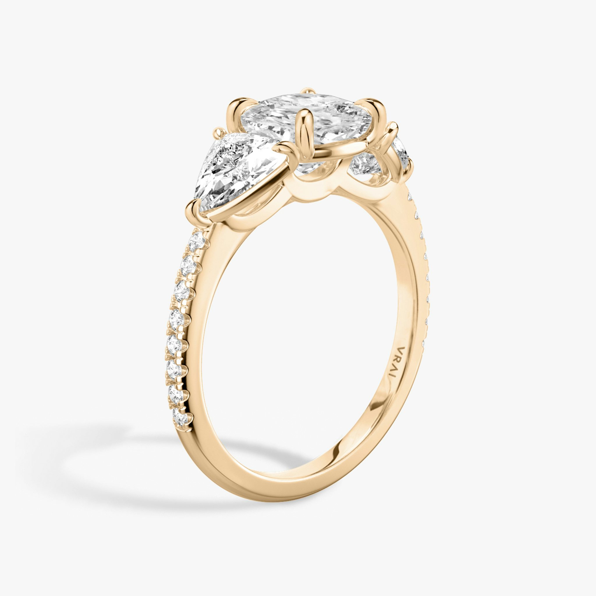 The Three Stone | Cushion | 14k | Rose Gold | bandAccent: Pavé | sideStoneCarat: 0.50ct | sideStoneShape: Trillion | diamondOrientation: vertical | caratWeight: other