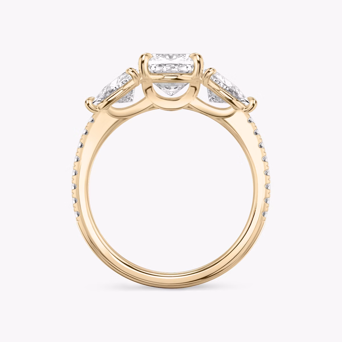 The Three Stone | Cushion | 14k | Rose Gold | bandAccent: Pavé | sideStoneCarat: 0.50ct | sideStoneShape: Trillion | diamondOrientation: vertical | caratWeight: other