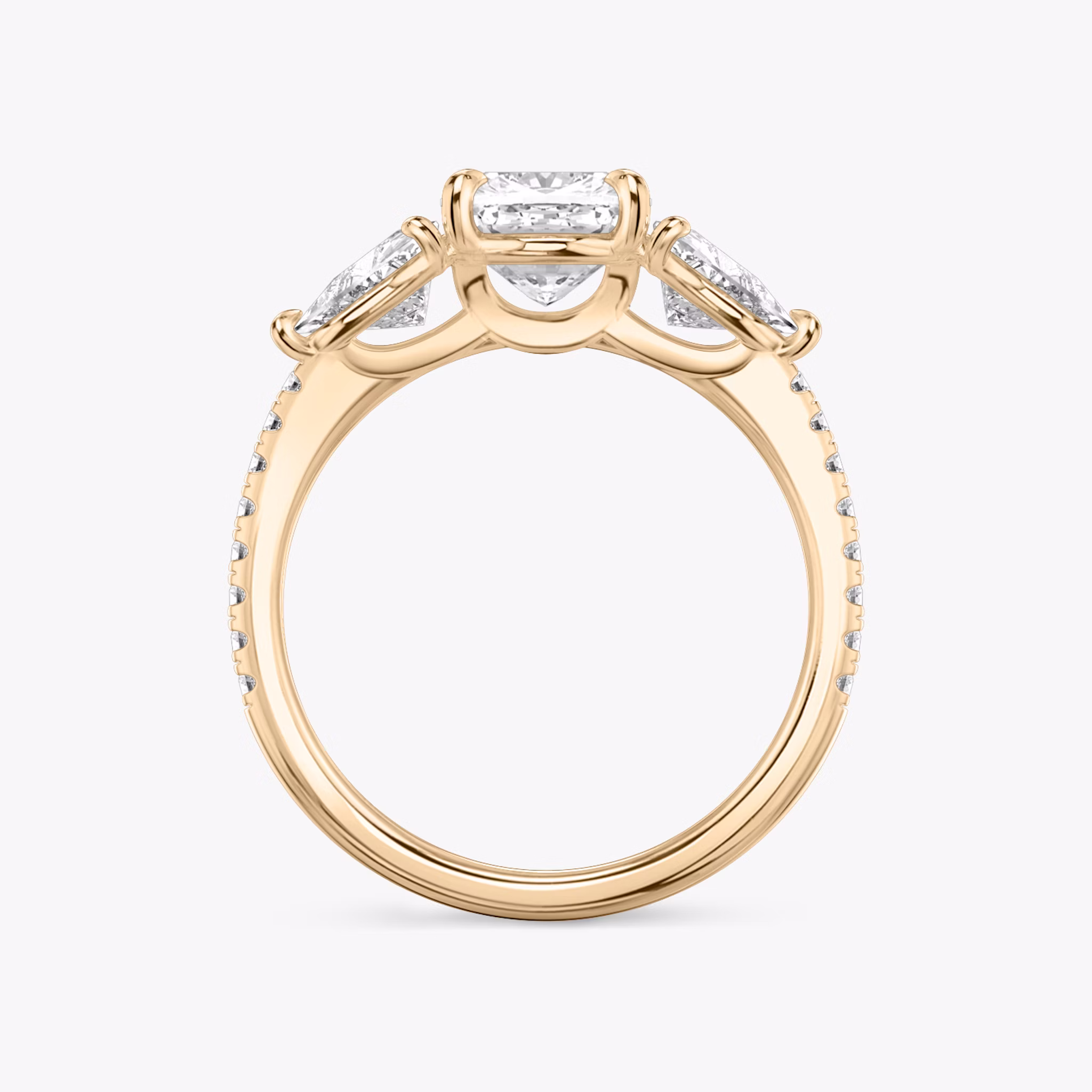 The Three Stone | Cushion | 14k | Rose Gold | bandAccent: Pavé | sideStoneCarat: 0.50ct | sideStoneShape: Trillion | diamondOrientation: vertical | caratWeight: other