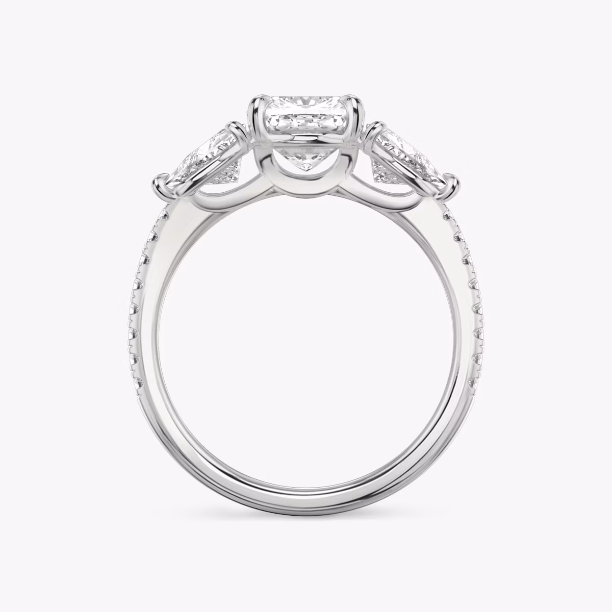 The Three Stone | Cushion | Platinum | bandAccent: Pavé | sideStoneCarat: 0.50ct | sideStoneShape: Trillion | diamondOrientation: vertical | caratWeight: other