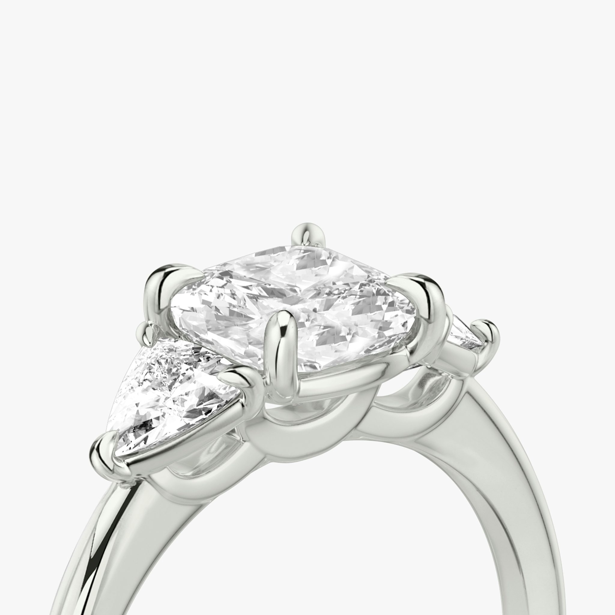 The Three Stone | Cushion | 18k | White Gold | bandAccent: Plain | sideStoneCarat: 0.25ct | sideStoneShape: Trillion | diamondOrientation: vertical | caratWeight: other