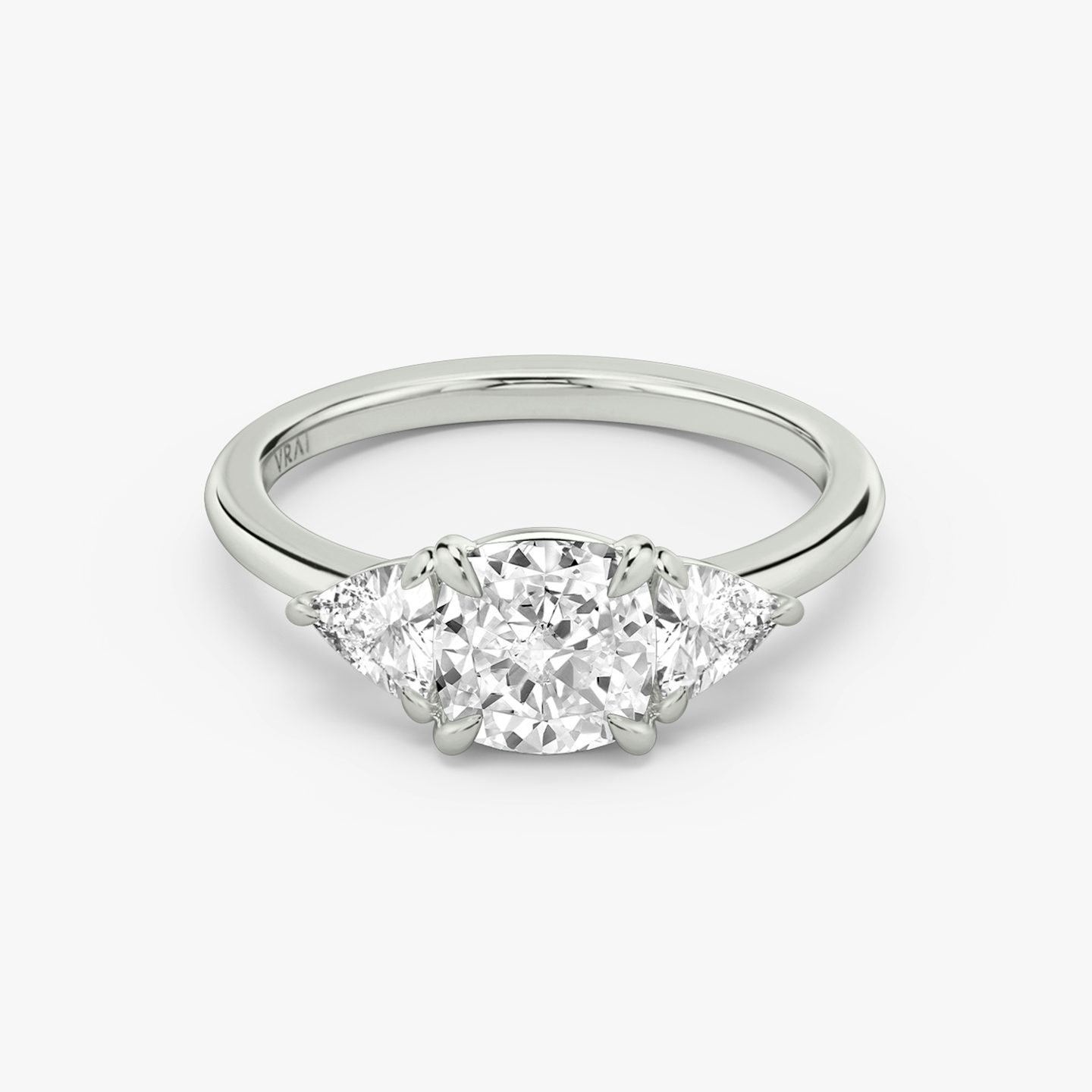 The Three Stone | Cushion | 18k | White Gold | bandAccent: Plain | sideStoneCarat: 0.25ct | sideStoneShape: Trillion | diamondOrientation: vertical | caratWeight: other