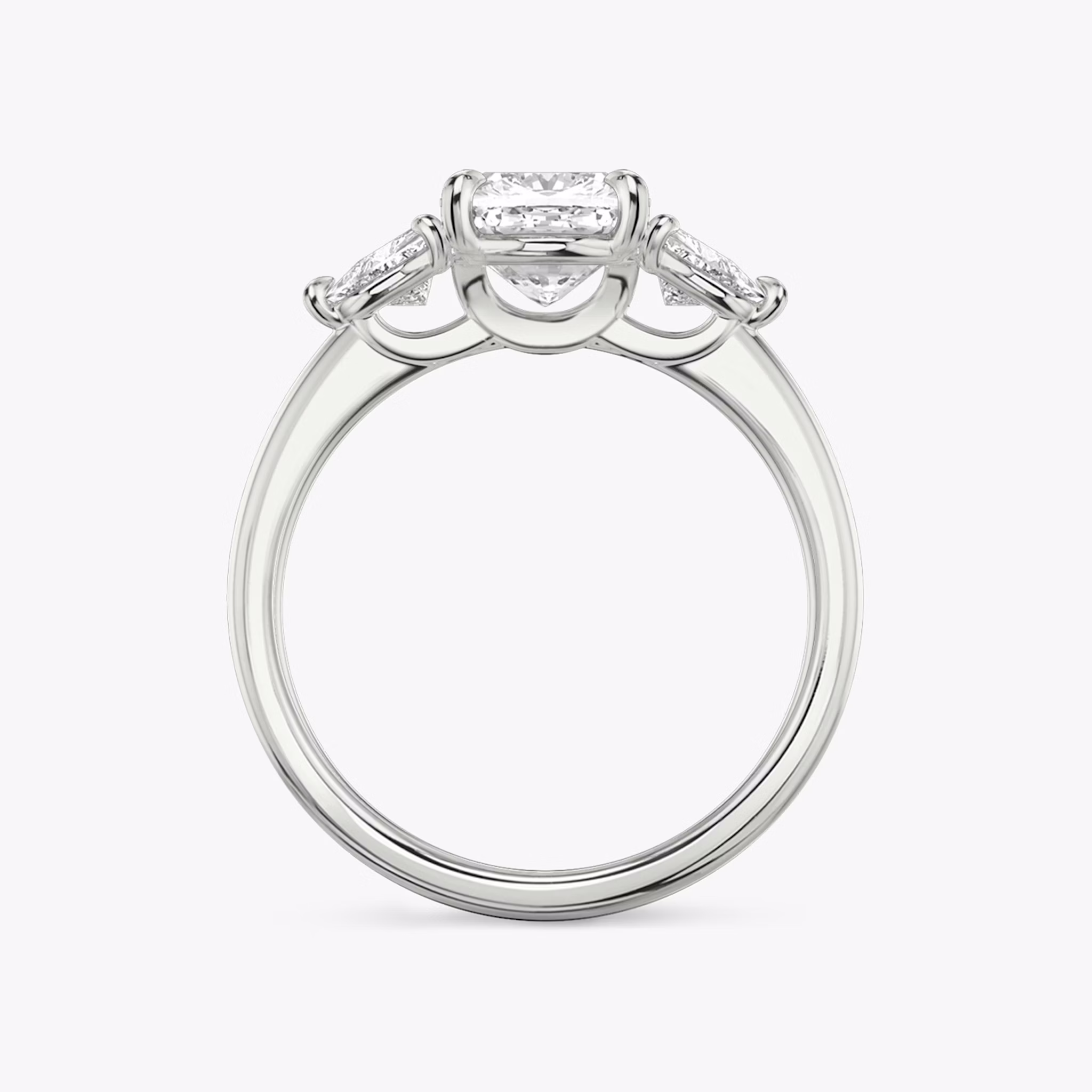 The Three Stone | Cushion | 18k | White Gold | bandAccent: Plain | sideStoneCarat: 0.25ct | sideStoneShape: Trillion | diamondOrientation: vertical | caratWeight: other