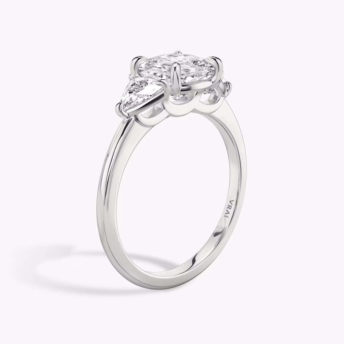 The Three Stone | Cushion | 18k | White Gold | bandAccent: Plain | sideStoneCarat: 0.25ct | sideStoneShape: Trillion | diamondOrientation: vertical | caratWeight: other