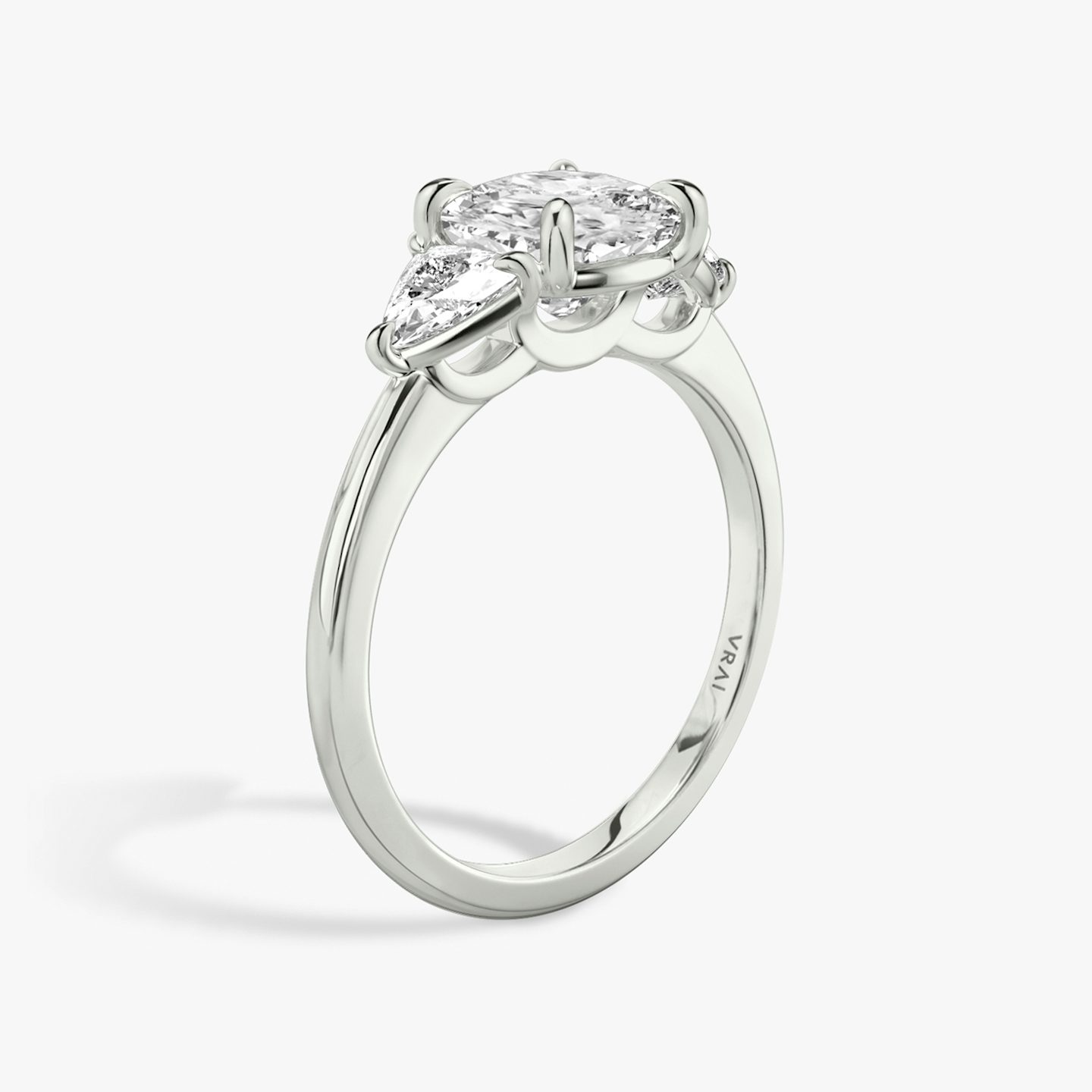 The Three Stone | Cushion | 18k | White Gold | bandAccent: Plain | sideStoneCarat: 0.25ct | sideStoneShape: Trillion | diamondOrientation: vertical | caratWeight: other