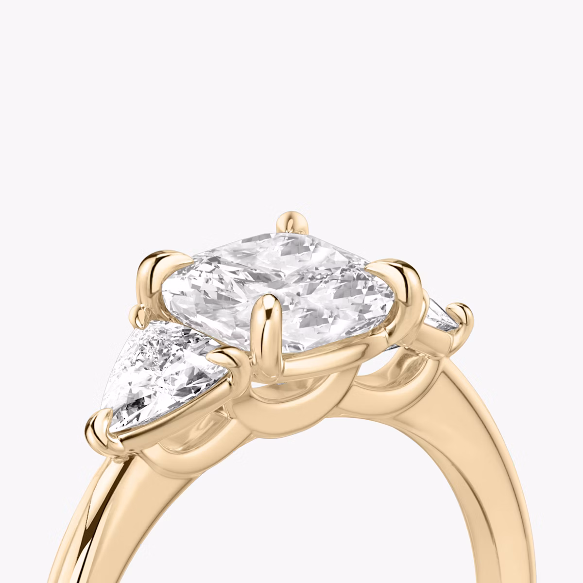 The Three Stone | Cushion | 14k | Rose Gold | bandAccent: Plain | sideStoneCarat: 0.25ct | sideStoneShape: Trillion | diamondOrientation: vertical | caratWeight: other