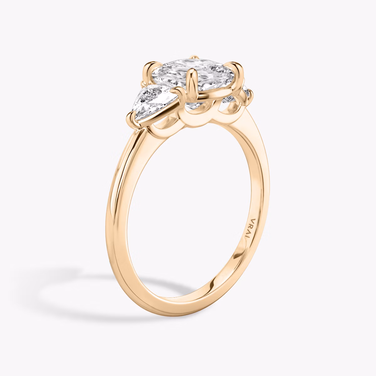 The Three Stone | Cushion | 14k | Rose Gold | bandAccent: Plain | sideStoneCarat: 0.25ct | sideStoneShape: Trillion | diamondOrientation: vertical | caratWeight: other