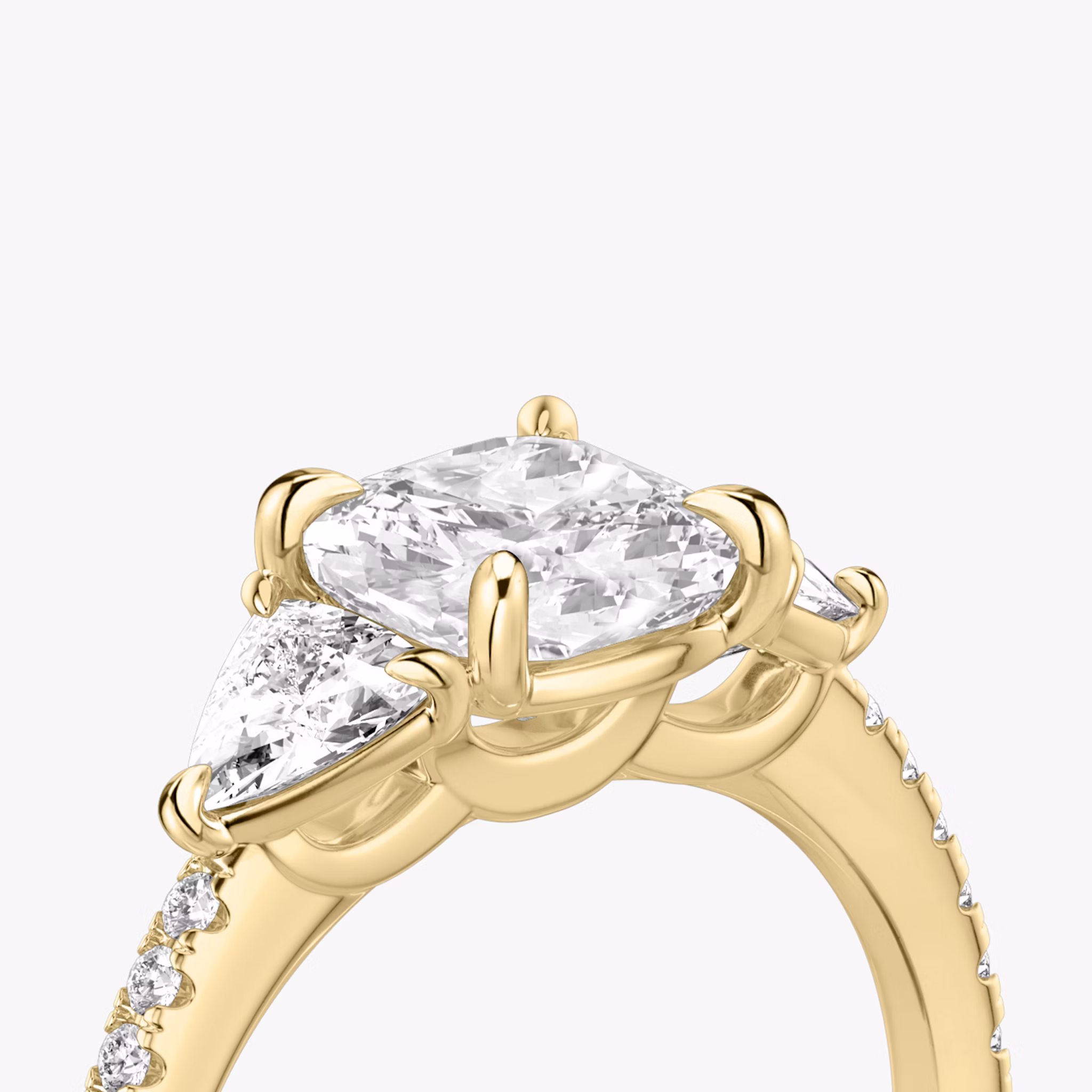 The Three Stone | Cushion | 18k | Yellow Gold | bandAccent: Pavé | sideStoneCarat: 0.25ct | sideStoneShape: Trillion | diamondOrientation: vertical | caratWeight: other