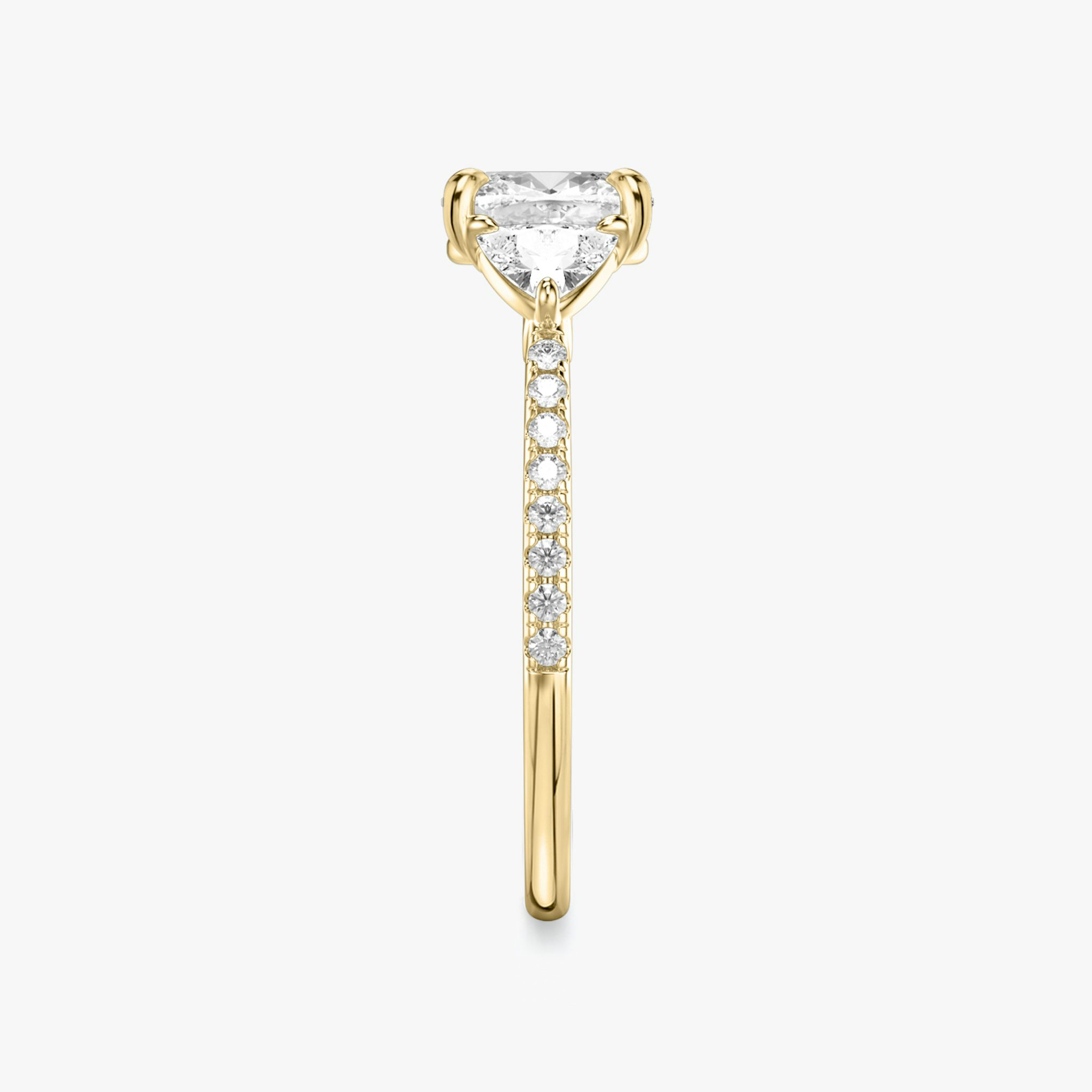 The Three Stone | Cushion | 18k | Yellow Gold | bandAccent: Pavé | sideStoneCarat: 0.25ct | sideStoneShape: Trillion | diamondOrientation: vertical | caratWeight: other