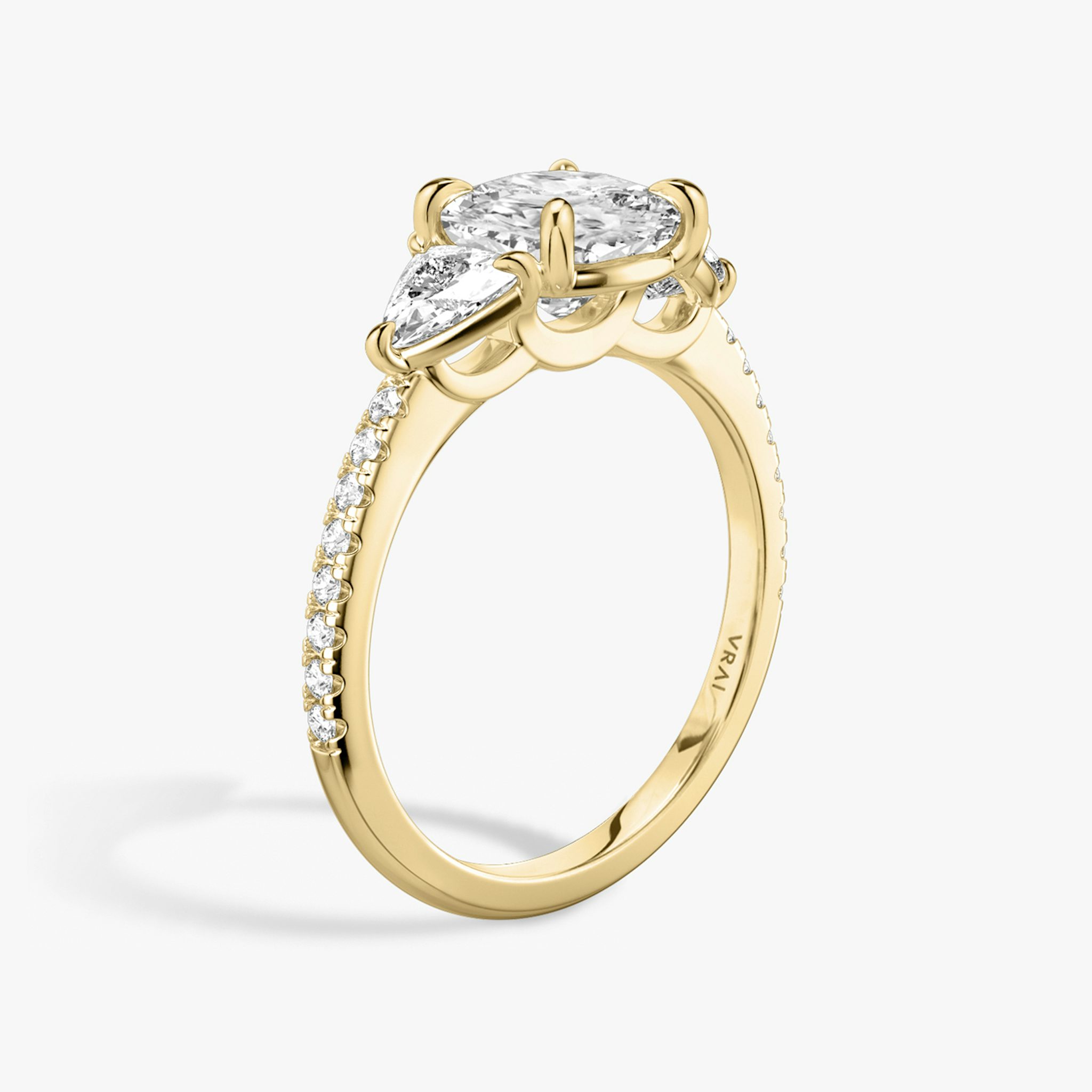 The Three Stone | Cushion | 18k | Yellow Gold | bandAccent: Pavé | sideStoneCarat: 0.25ct | sideStoneShape: Trillion | diamondOrientation: vertical | caratWeight: other