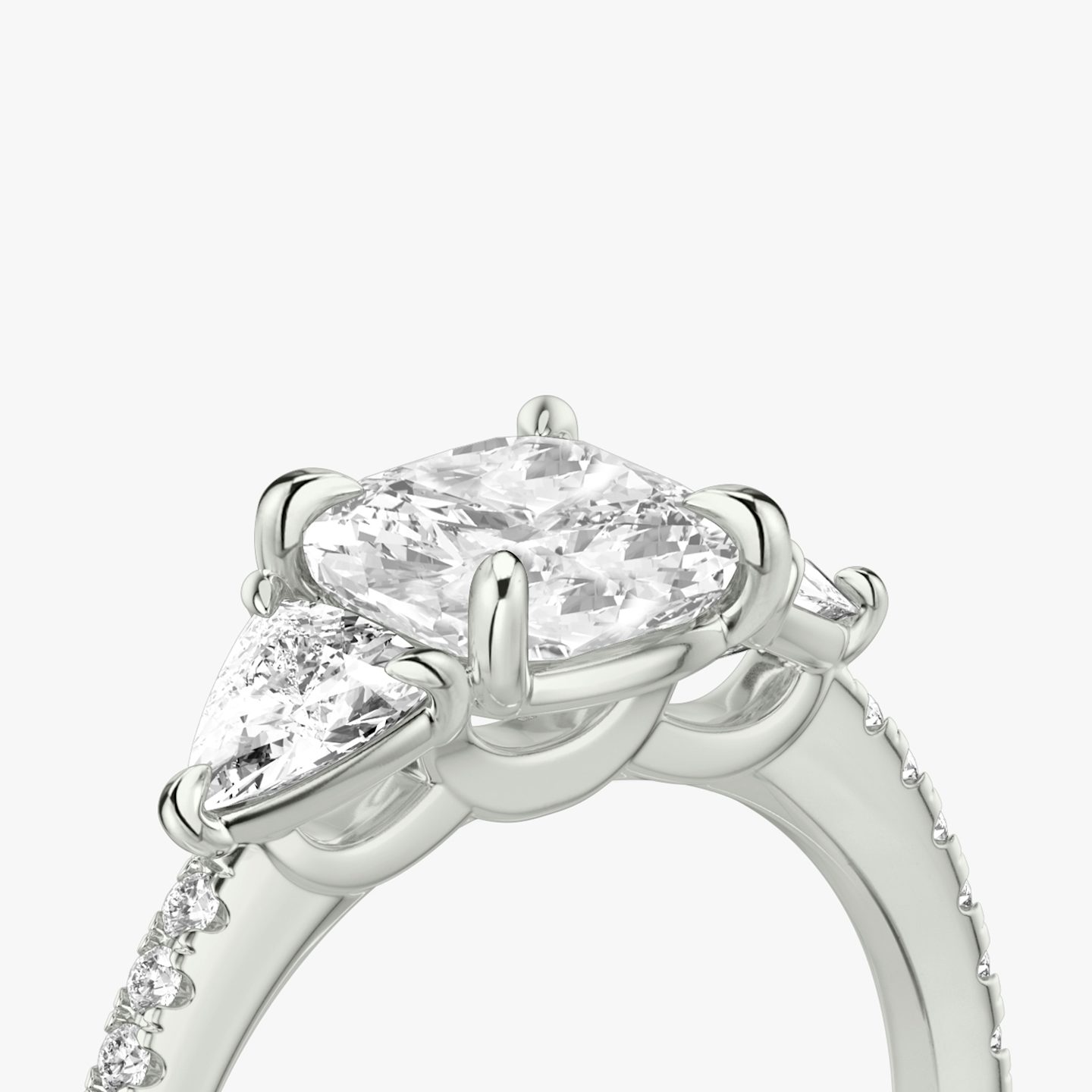 The Three Stone | Cushion | 18k | White Gold | bandAccent: Pavé | sideStoneCarat: 0.25ct | sideStoneShape: Trillion | diamondOrientation: vertical | caratWeight: other