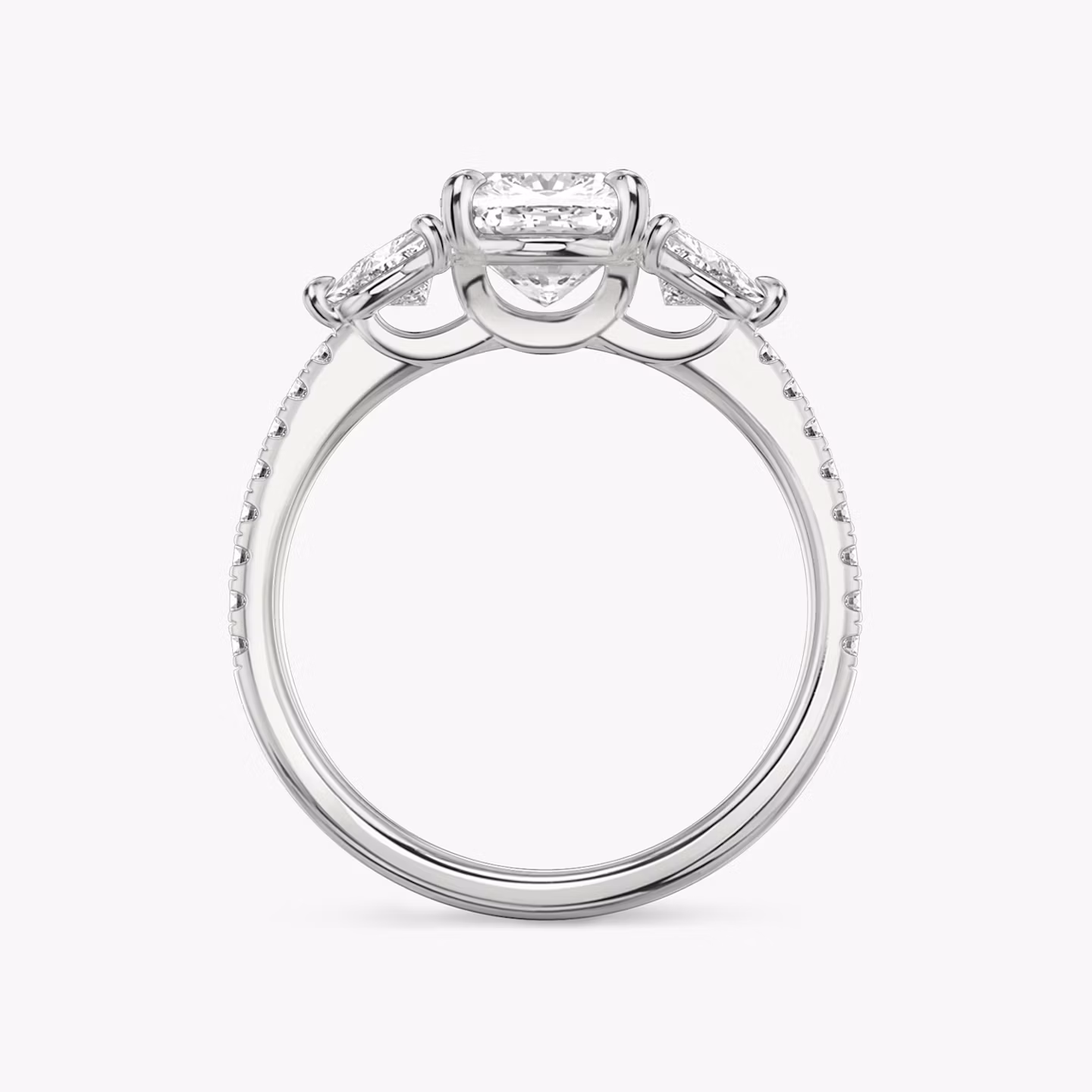 The Three Stone | Cushion | 18k | White Gold | bandAccent: Pavé | sideStoneCarat: 0.25ct | sideStoneShape: Trillion | diamondOrientation: vertical | caratWeight: other